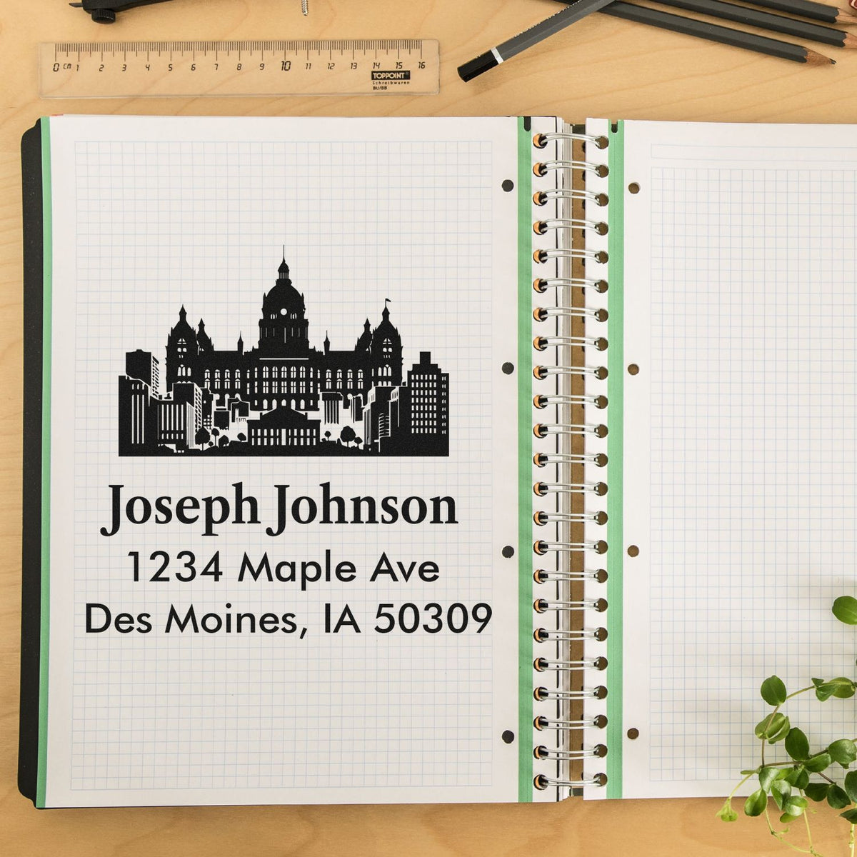 Personalized address rubber stamp with skyline design, imprinting Joseph Johnson, 1234 Maple Ave, Des Moines, IA 50309.