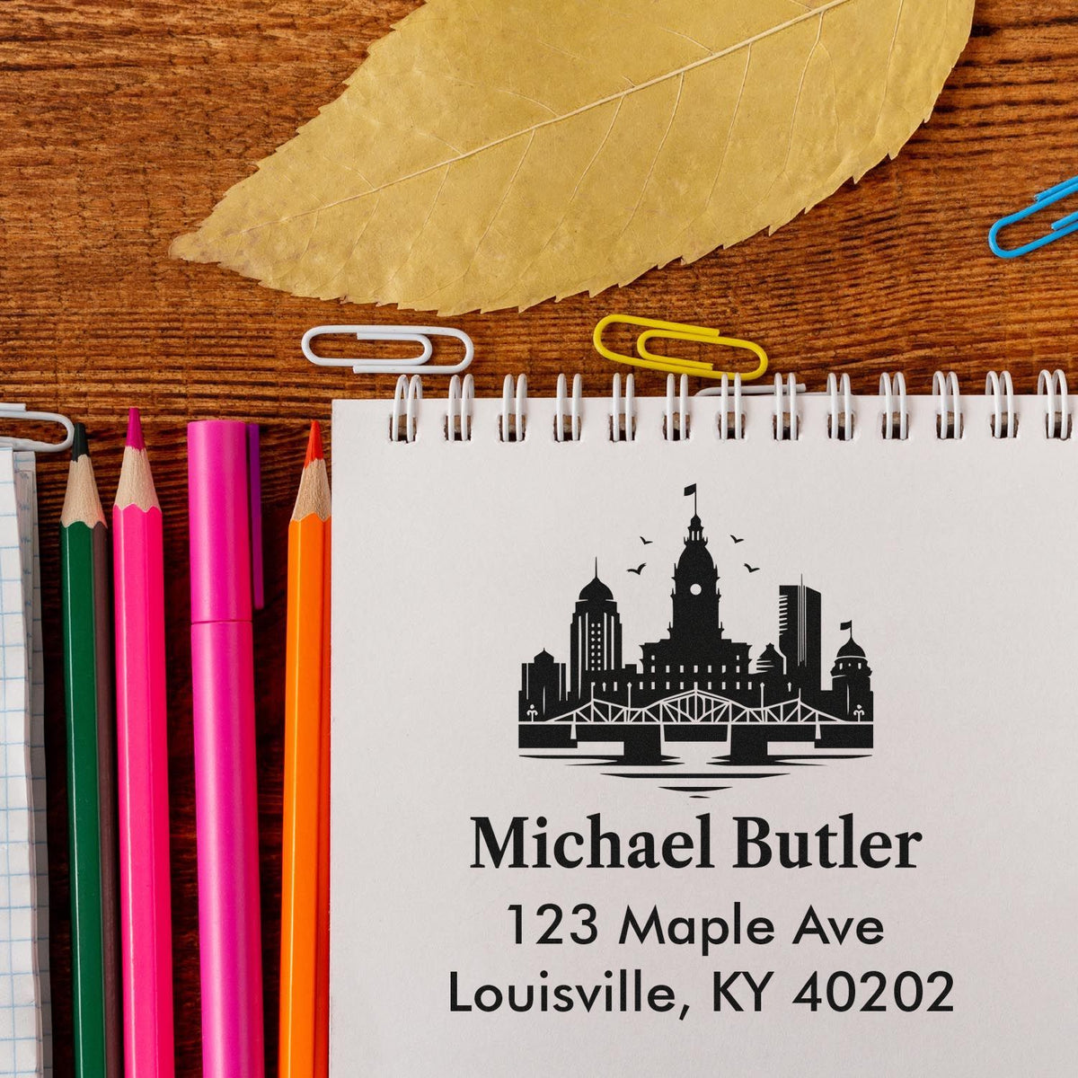 Personalized Louisville, KY address rubber stamp with city skyline design for custom mail, stationery, and branding.