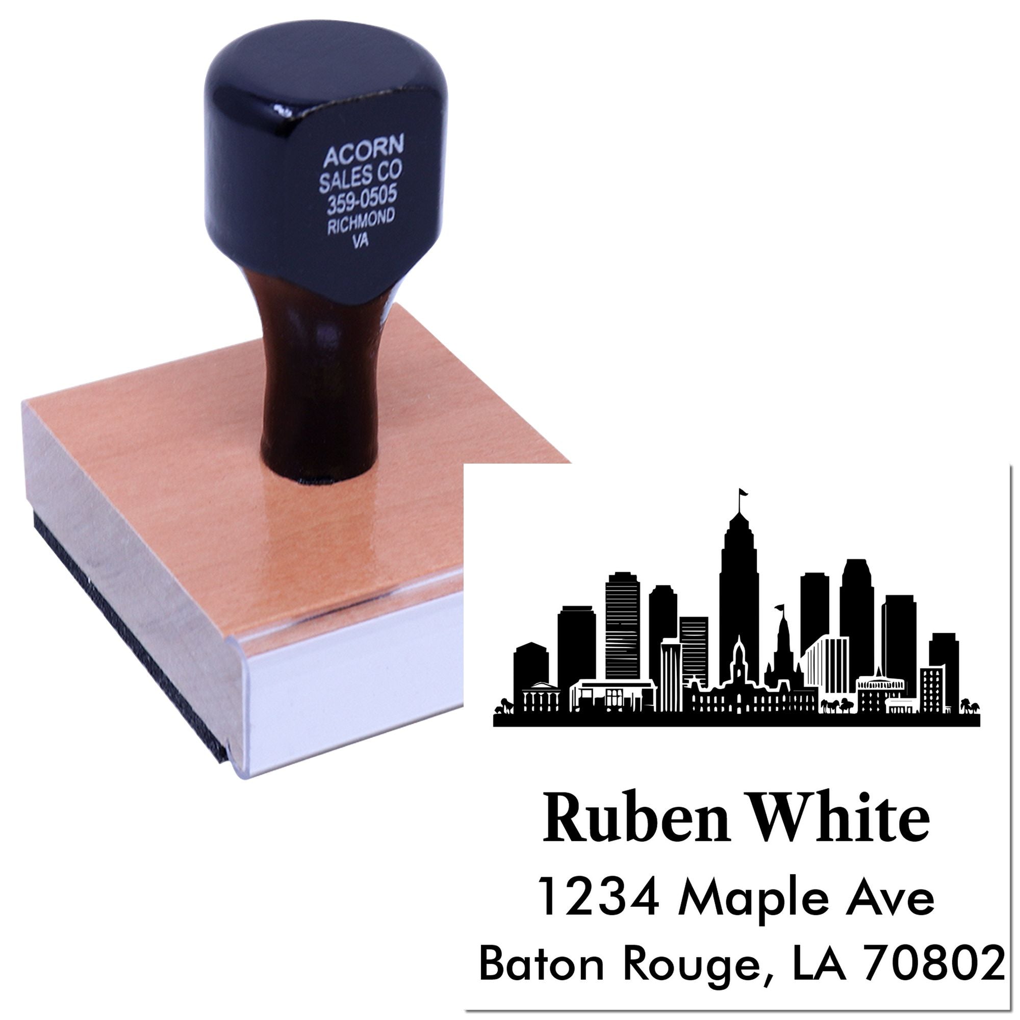 Custom address rubber stamp with skyline logo and sample imprint for Baton Rouge business.