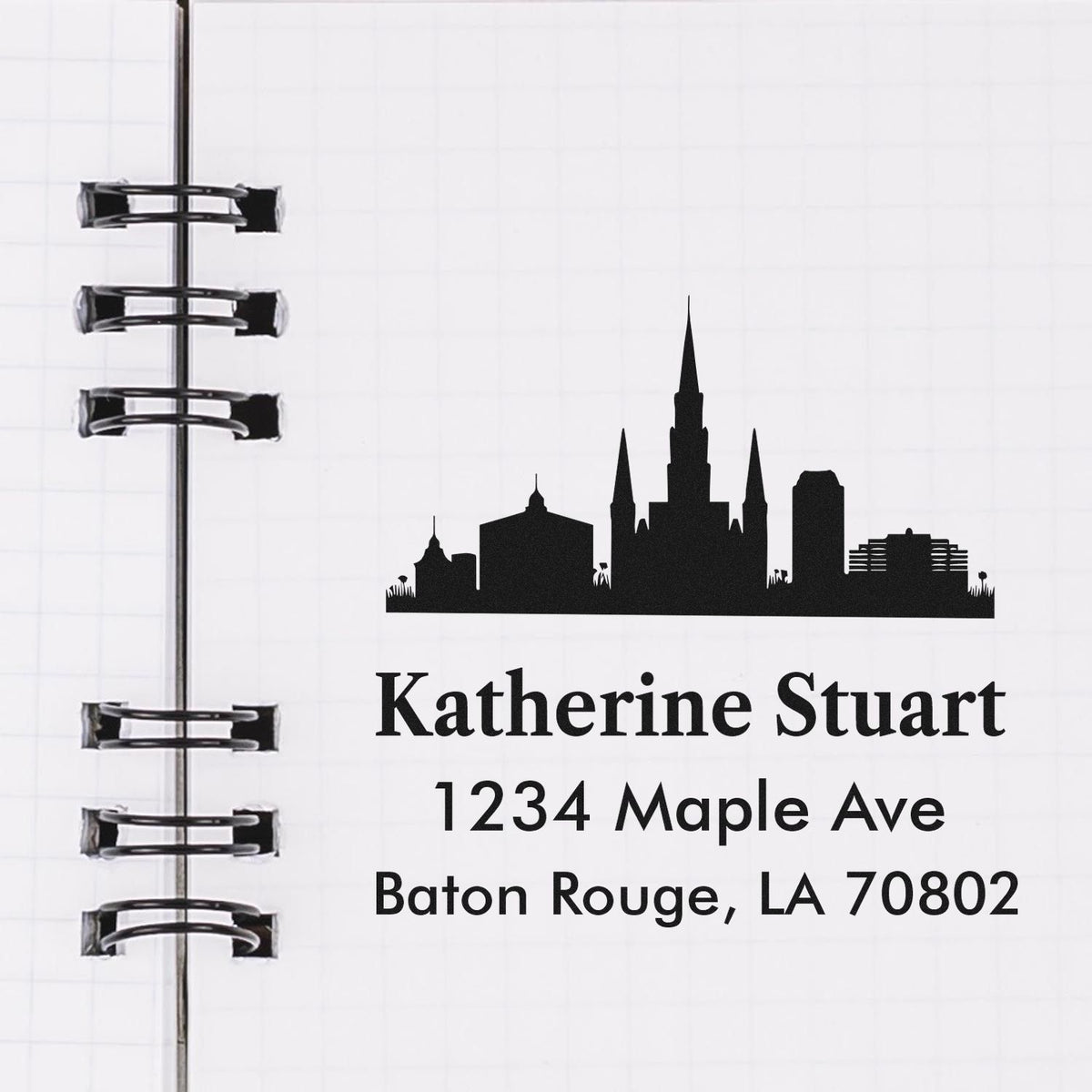 Custom return address rubber stamp with Baton Rouge skyline, Katherine Stuart, 1234 Maple Ave, Baton Rouge, LA 70802.