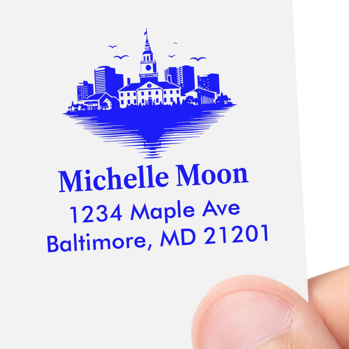 Custom rubber address stamp with Baltimore skyline, Michelle Moon, 1234 Maple Ave, Baltimore, MD 21201