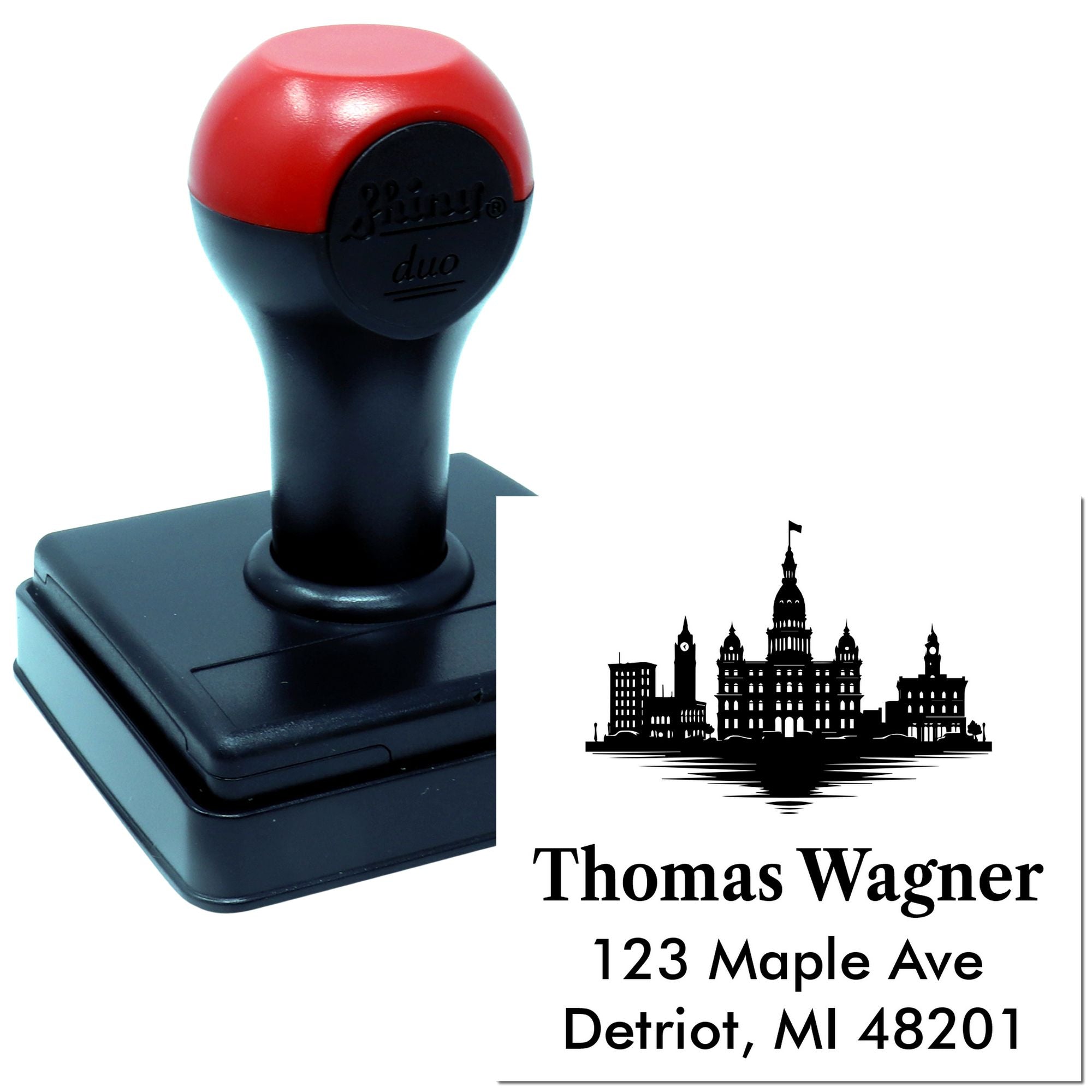 Custom self-inking rubber address stamp with skyline design, personalized name, and mailing address.