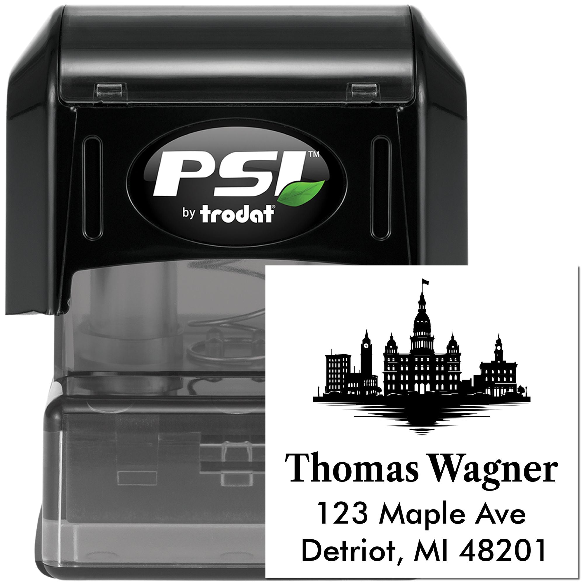 Custom self-inking address stamp by PSI Trodat with skyline design, Thomas Wagner name, and Detroit, MI return address.
