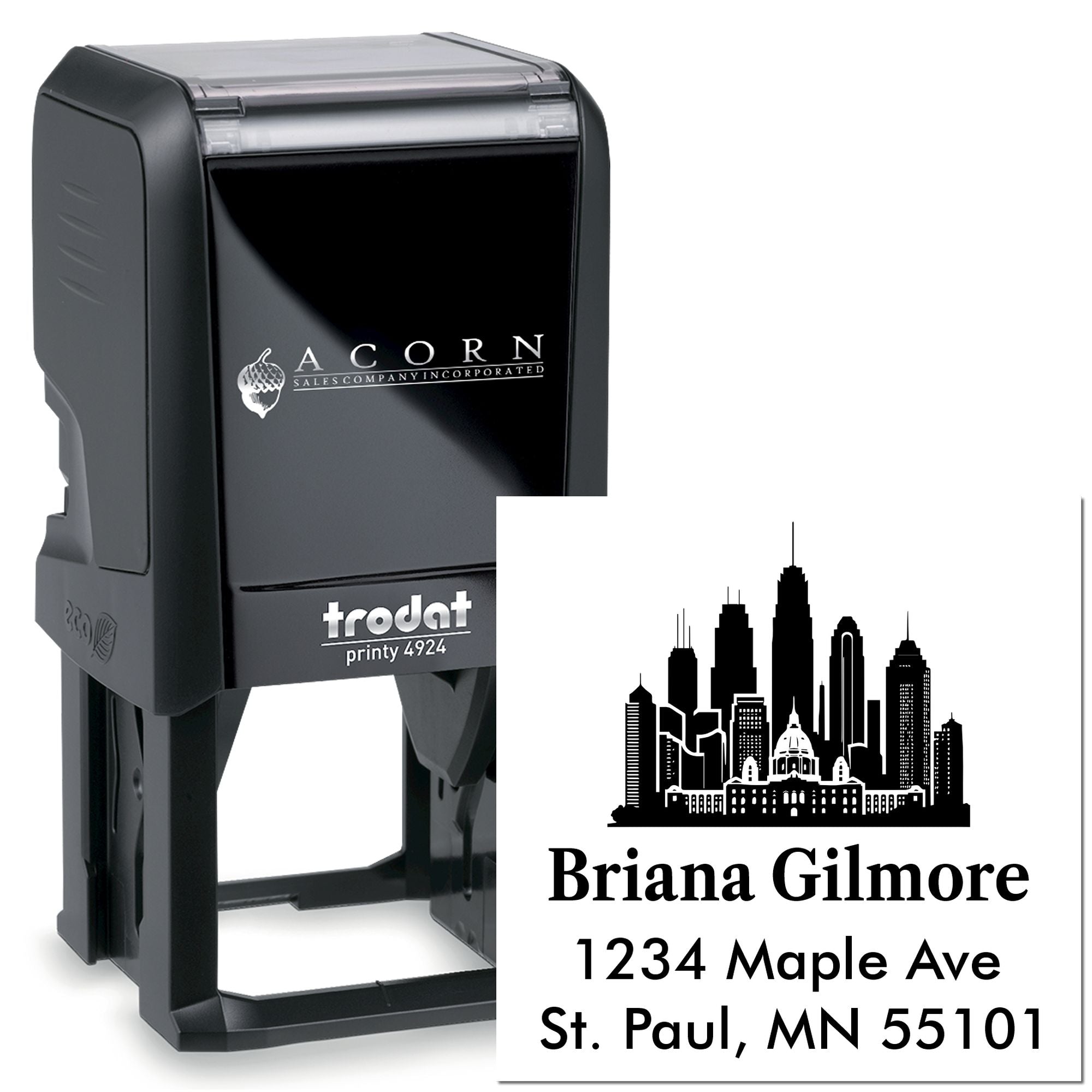 Custom Trodat self-inking address rubber stamp with skyline design and personalized St. Paul, MN return address.