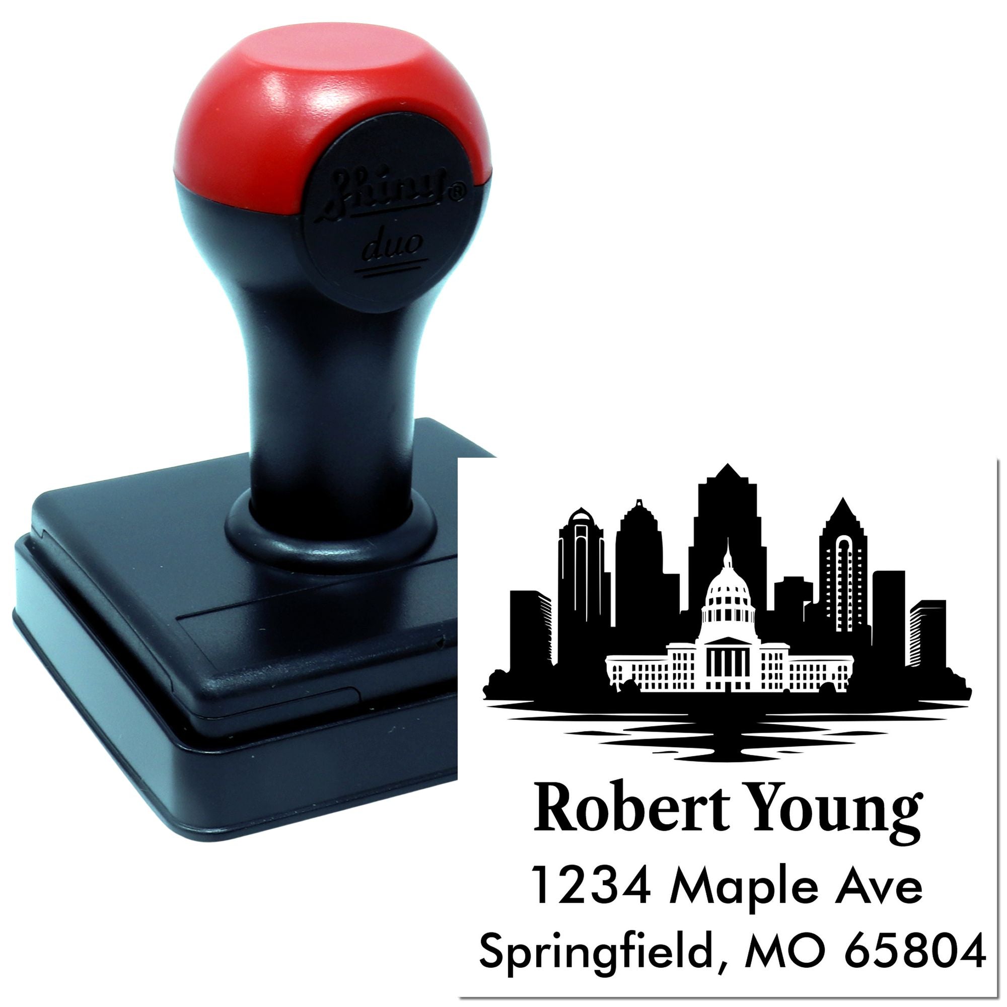 Custom self-inking rubber address stamp with city skyline design for personalized return mailing.