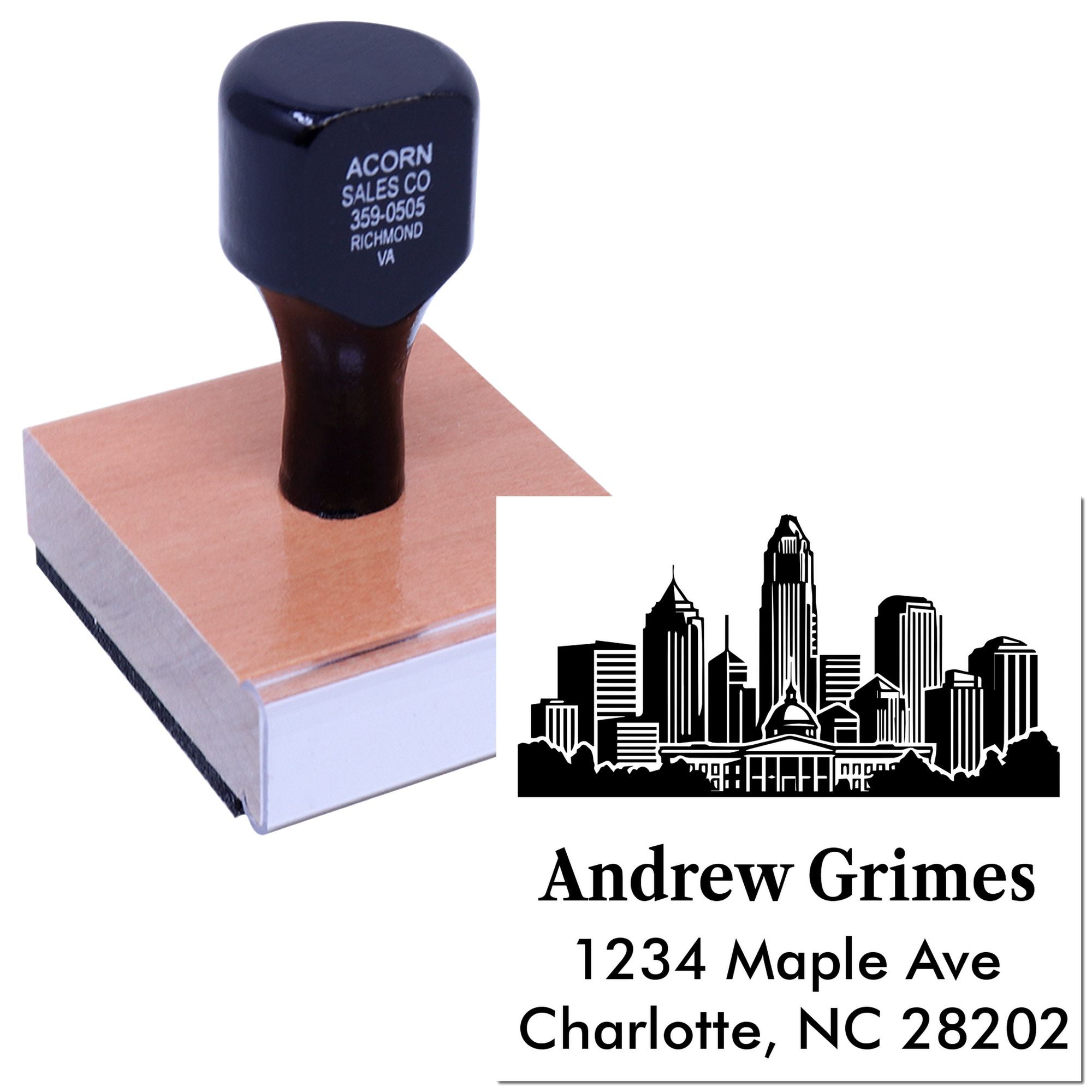 Custom self-inking rubber address stamp with skyline logo and personalized business name, address, and Charlotte, NC imprint