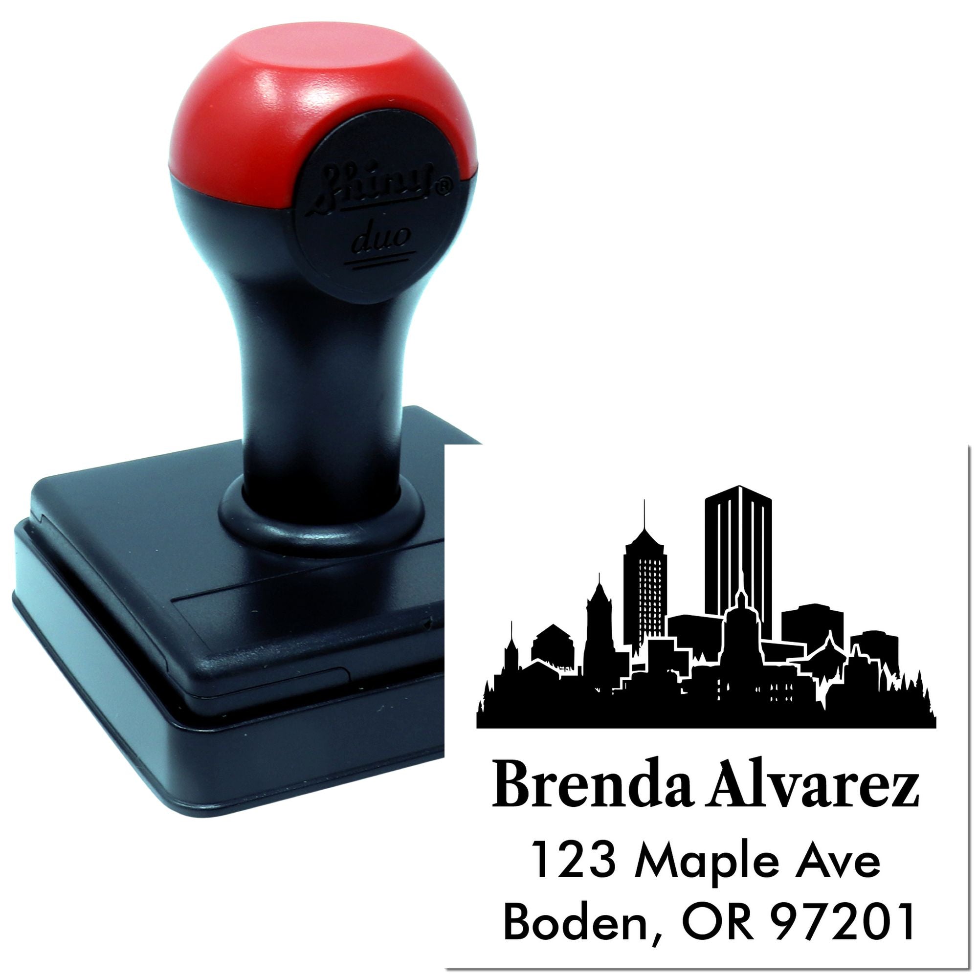 Custom self-inking rubber address stamp with skyline design, personalized with name and OR address.