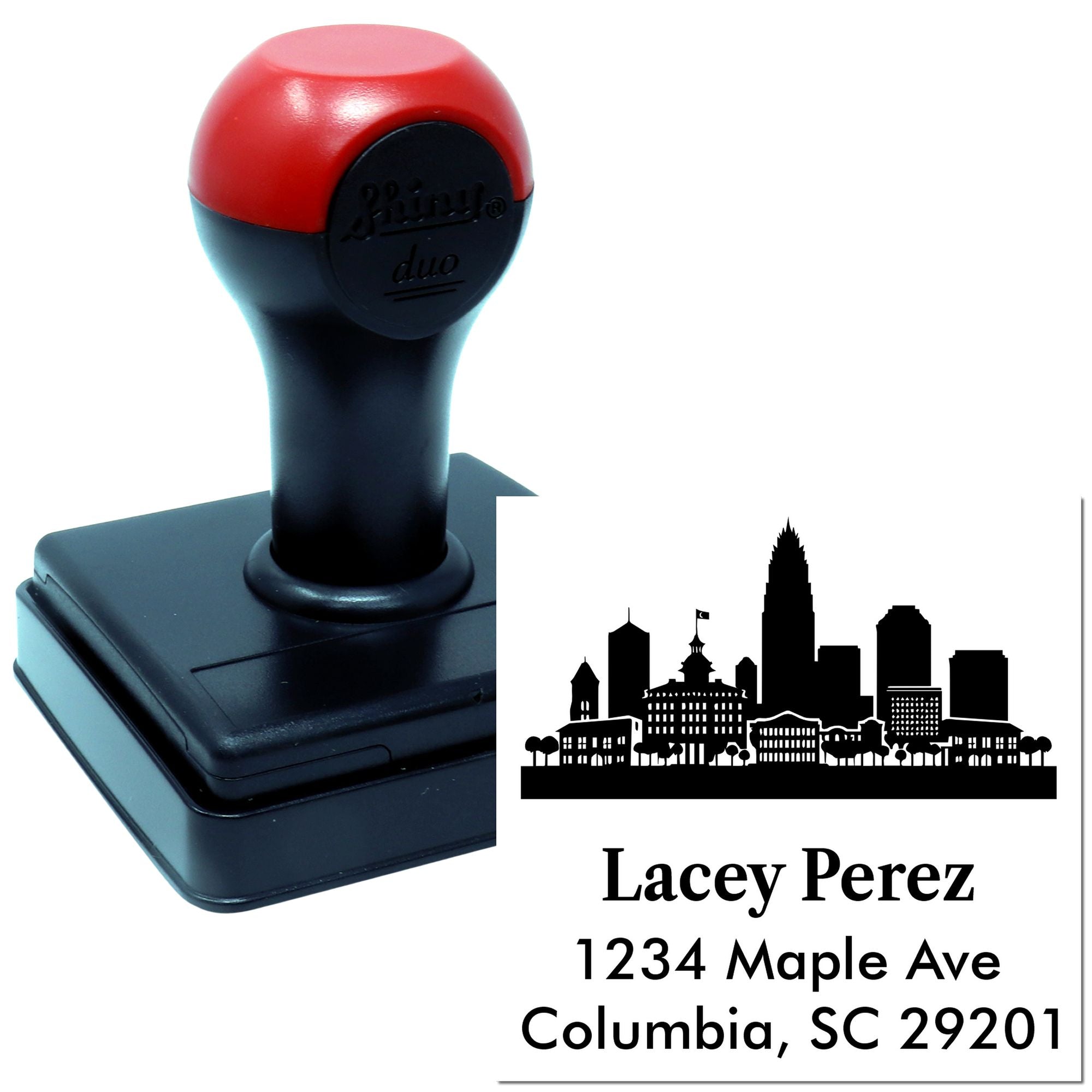 Custom self-inking rubber return address stamp with skyline design, name, and Columbia, SC mailing address imprint.