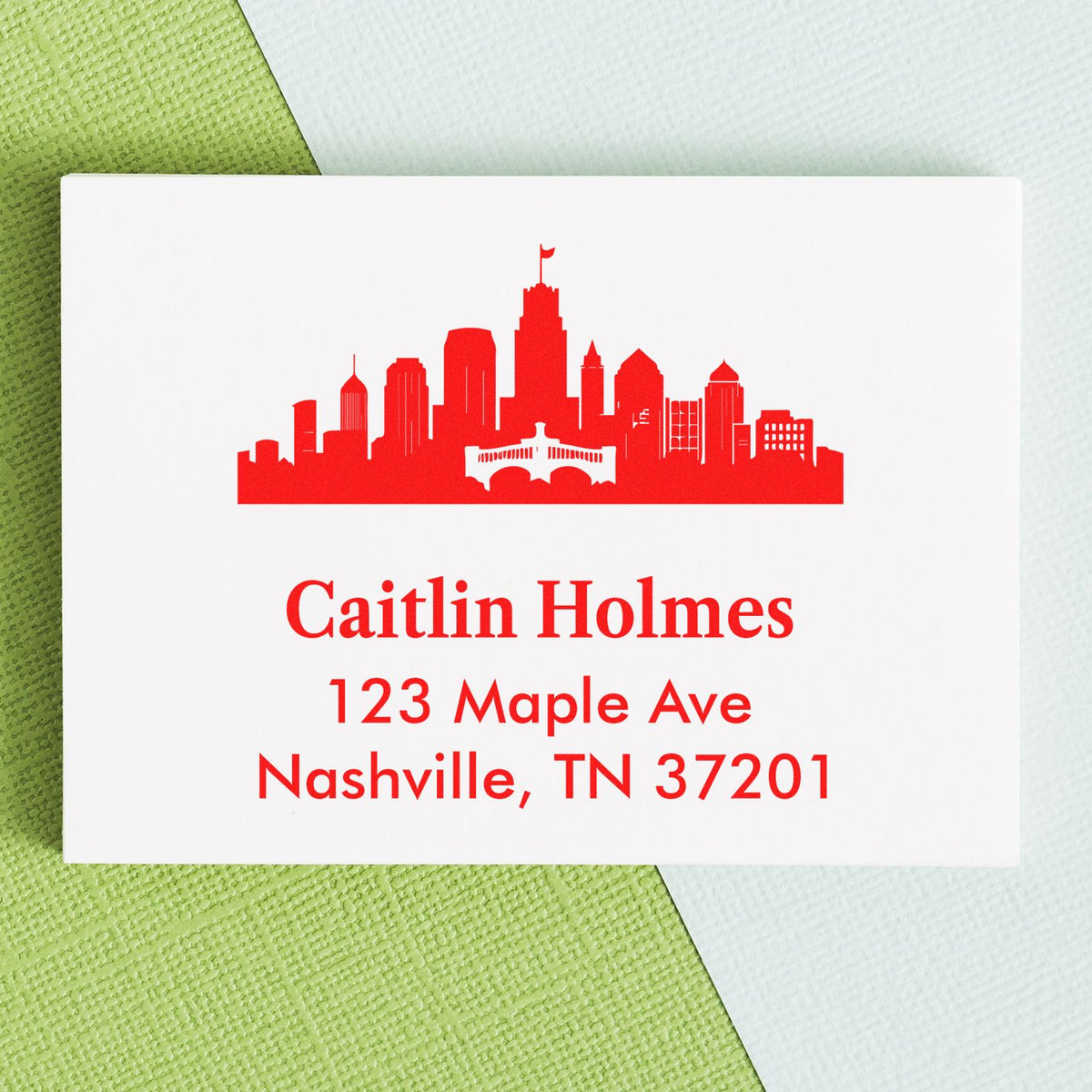 Custom Nashville skyline rubber address stamp with personalized name and return address for Caitlin Holmes.