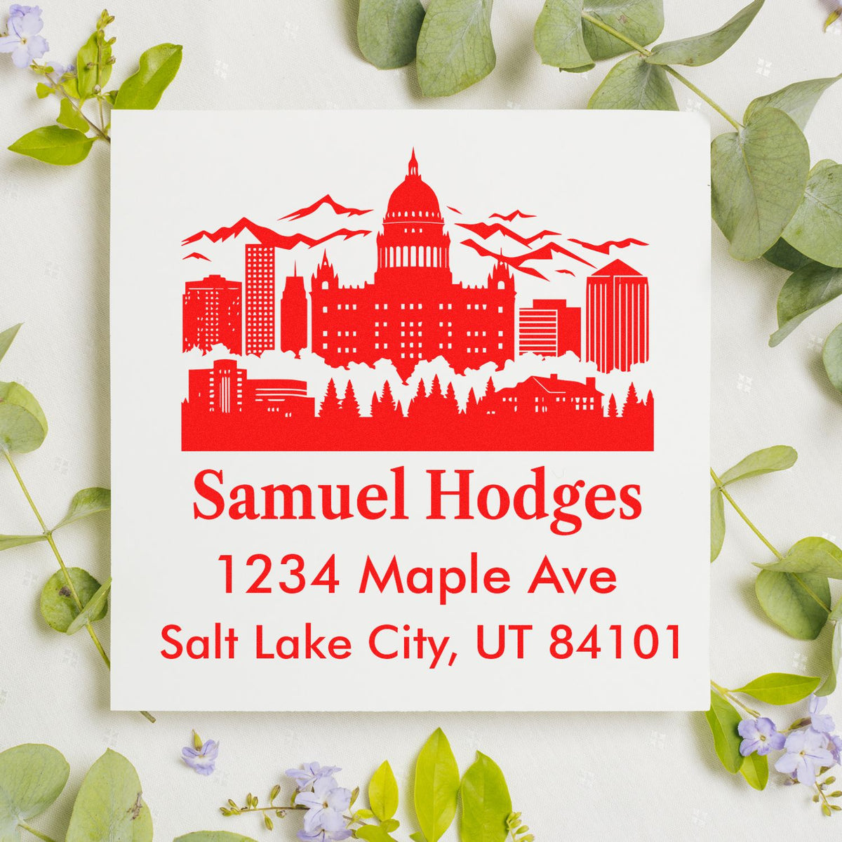 Custom Salt Lake City address rubber stamp with skyline design, Samuel Hodges name, and Maple Ave return address.