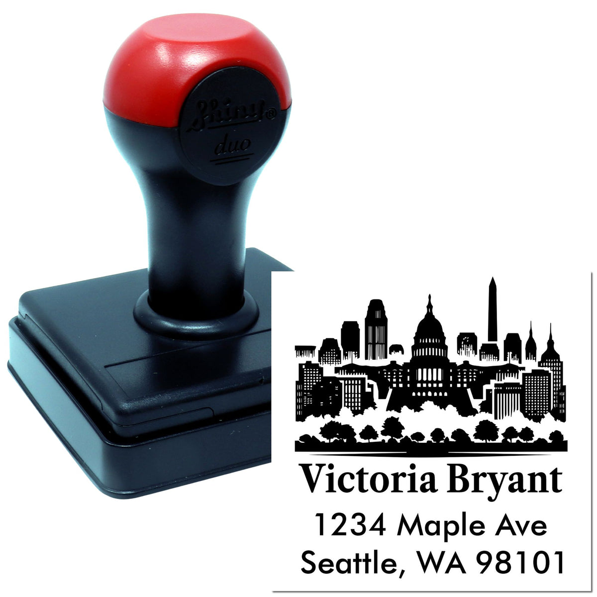 Custom self-inking rubber address stamp with Seattle skyline, name, and return address for Victoria Bryant.