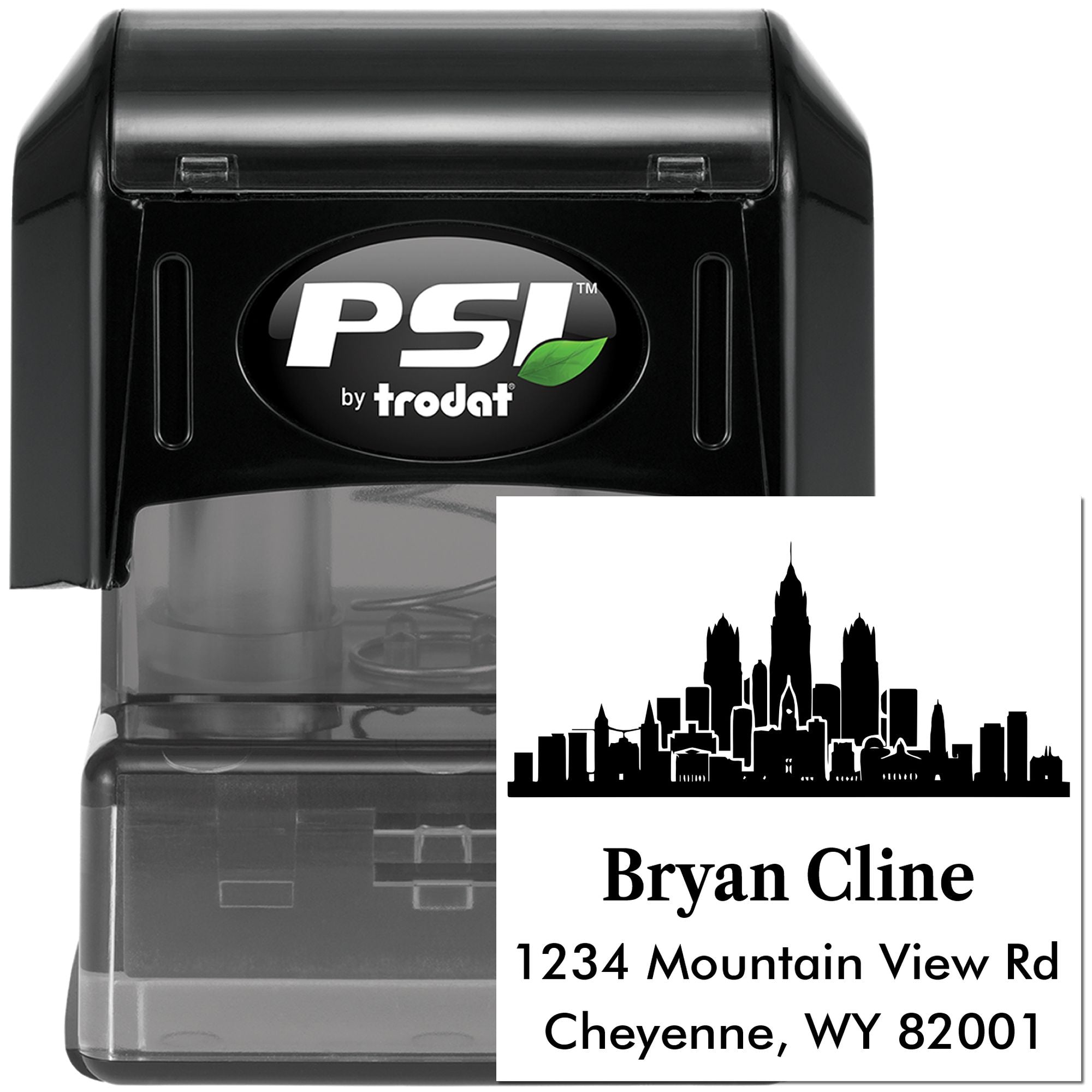 Personalized self-inking rubber address stamp with skyline design for Bryan Cline, 1234 Mountain View Rd, Cheyenne, WY 82001.