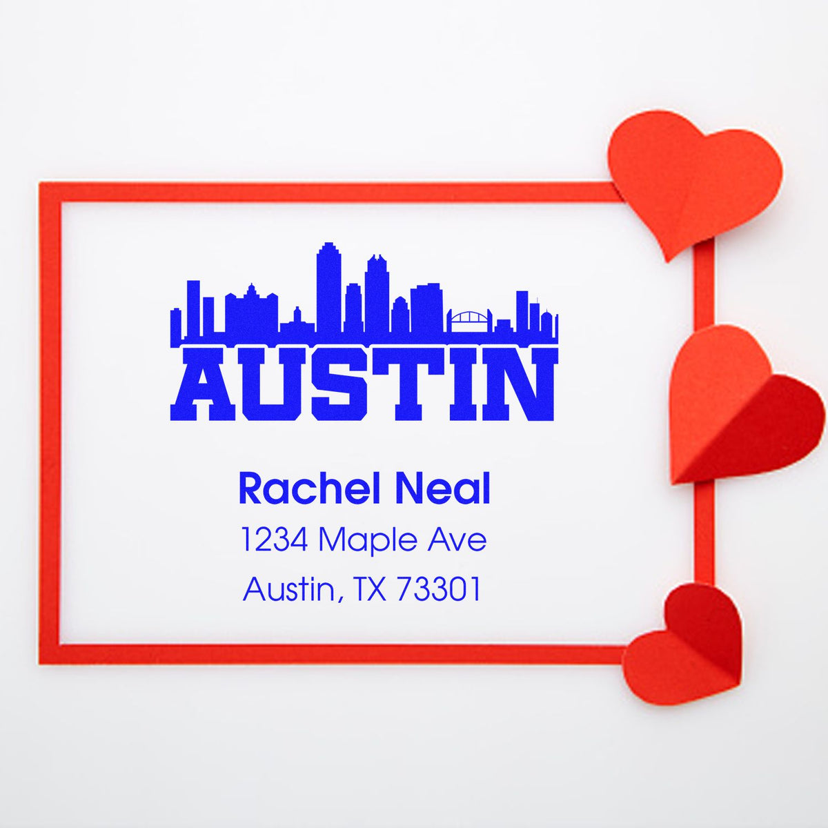 Custom Austin return address rubber stamp with skyline design and heart accents for personalized mailing.