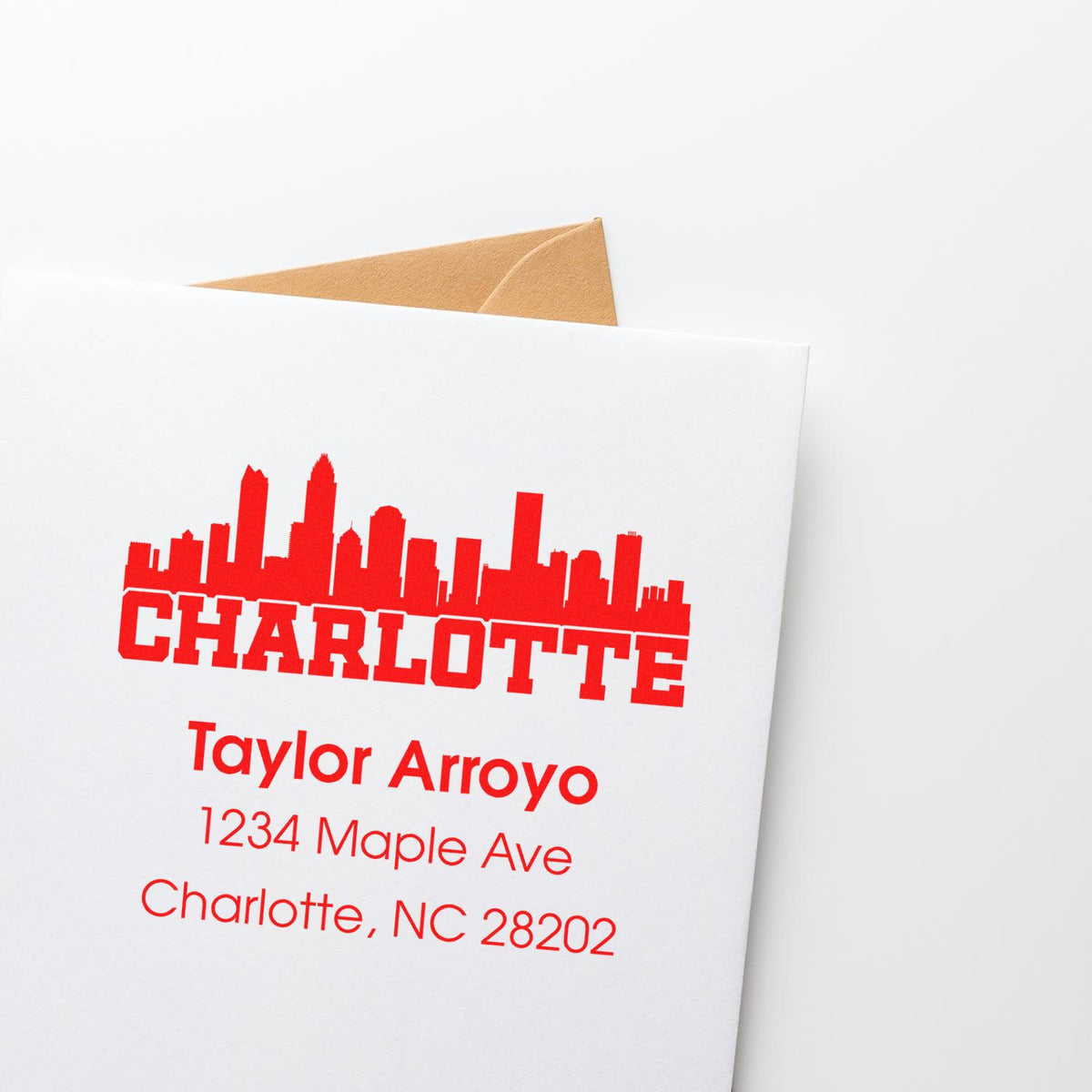 Custom rubber stamp return address on stationery with Charlotte skyline for Taylor Arroyo, Charlotte, NC 28202