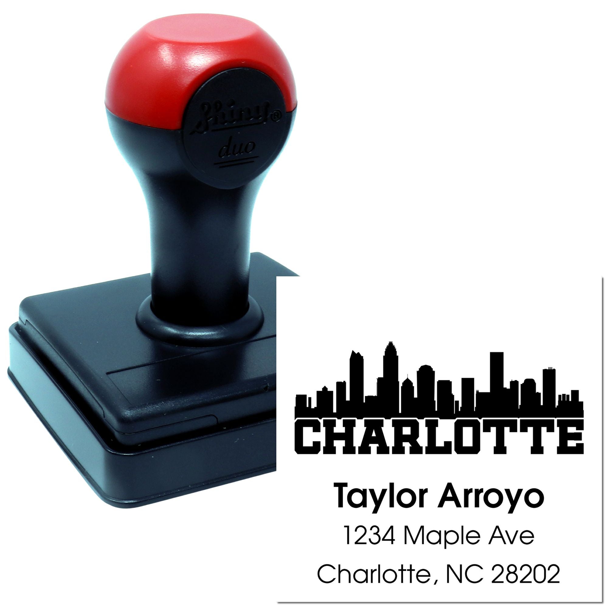 Custom self-inking rubber return address stamp with Charlotte skyline for Taylor Arroyo, 1234 Maple Ave, Charlotte, NC 28202