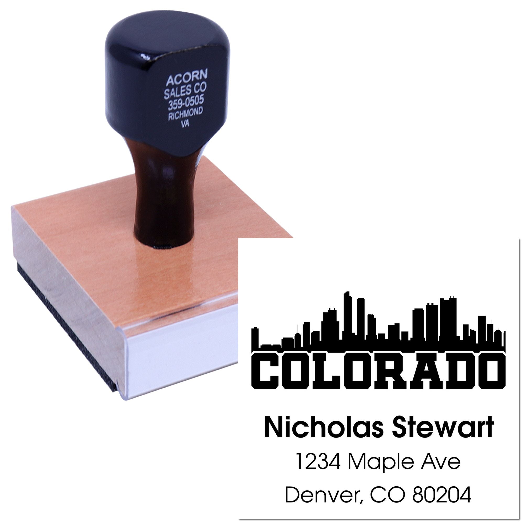 Custom self-inking rubber stamp with Colorado skyline address imprint for Nicholas Stewart, Denver, CO 80204.