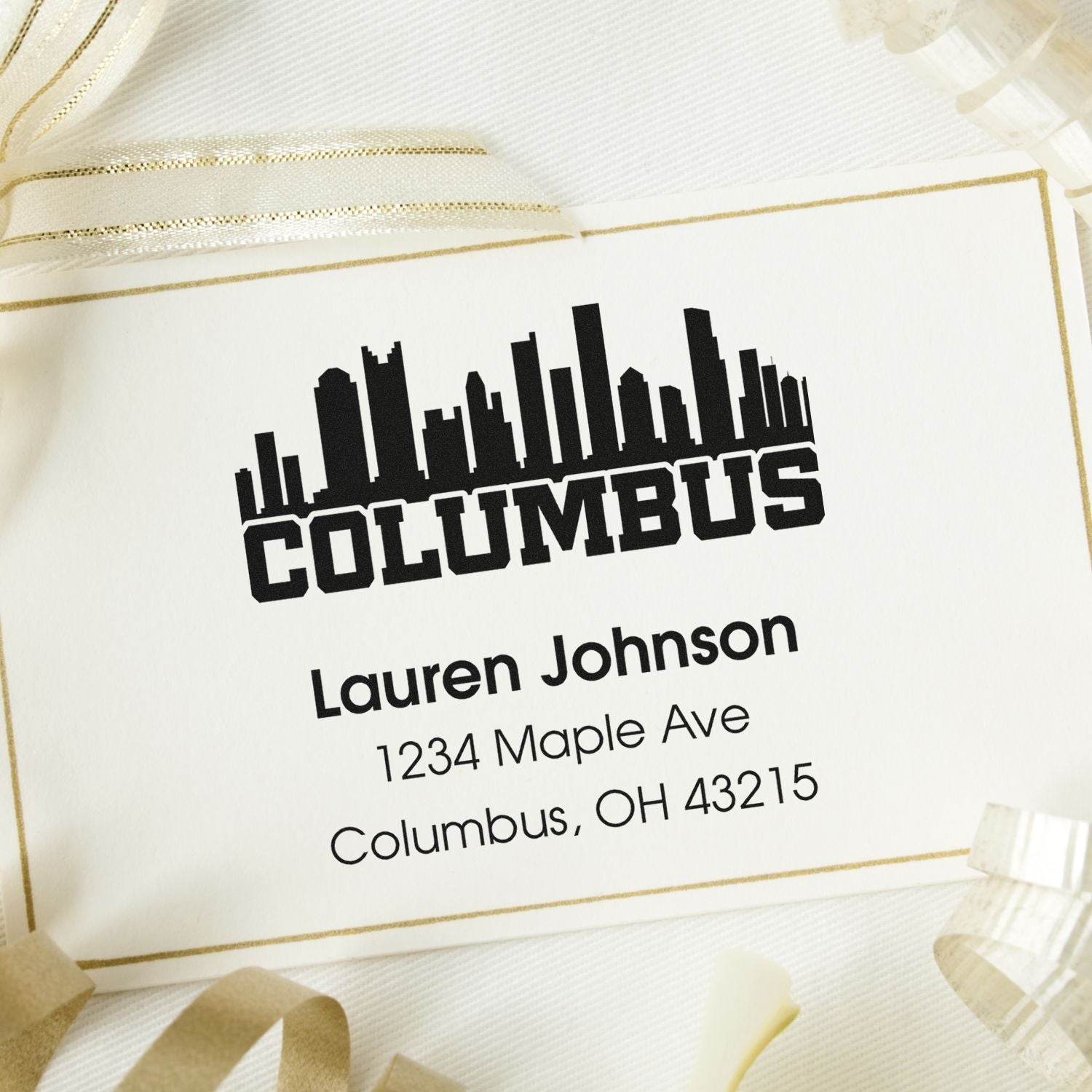 Custom Columbus address rubber stamp with skyline design, Lauren Johnson, 1234 Maple Ave, Columbus, OH 43215.