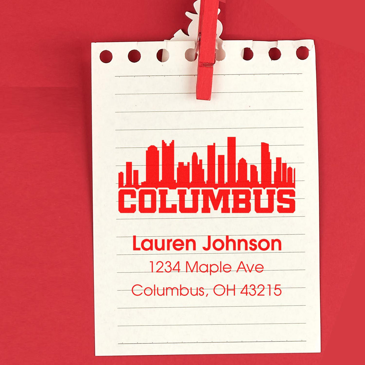 Custom Columbus return address rubber stamp with skyline design, Lauren Johnson name, and Ohio address on lined notepad.