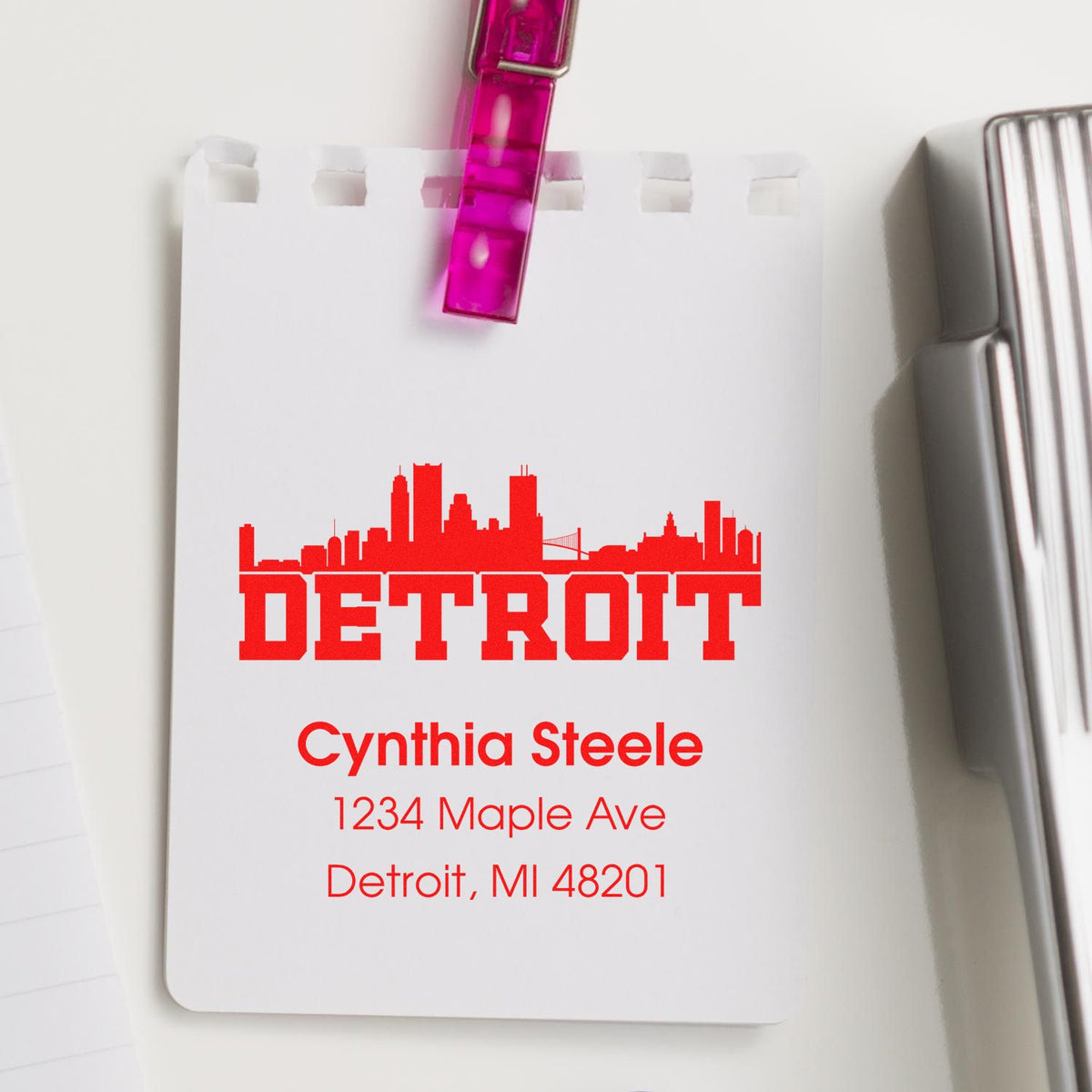 Custom Detroit return address rubber stamp with skyline design for Cynthia Steele, 1234 Maple Ave, Detroit, MI 48201.