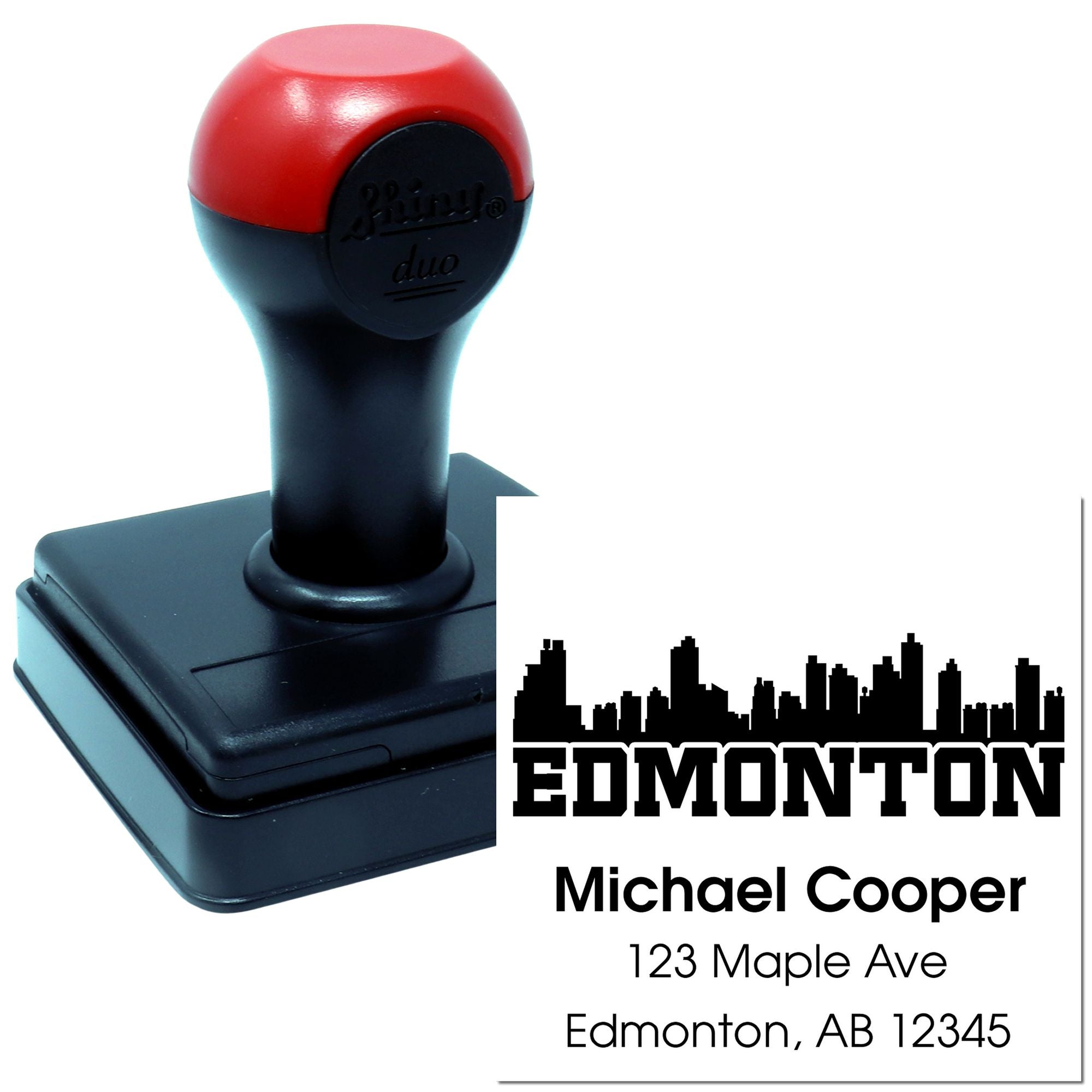 Custom self-inking address stamp with Edmonton skyline, Michael Cooper, 123 Maple Ave, Edmonton, AB 12345.