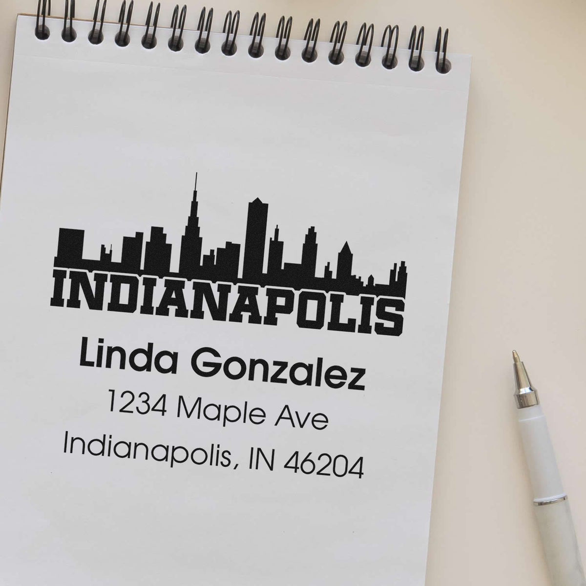 Custom Indianapolis address rubber stamp with skyline design, personalized for Linda Gonzalez, 1234 Maple Ave, Indianapolis IN 46204