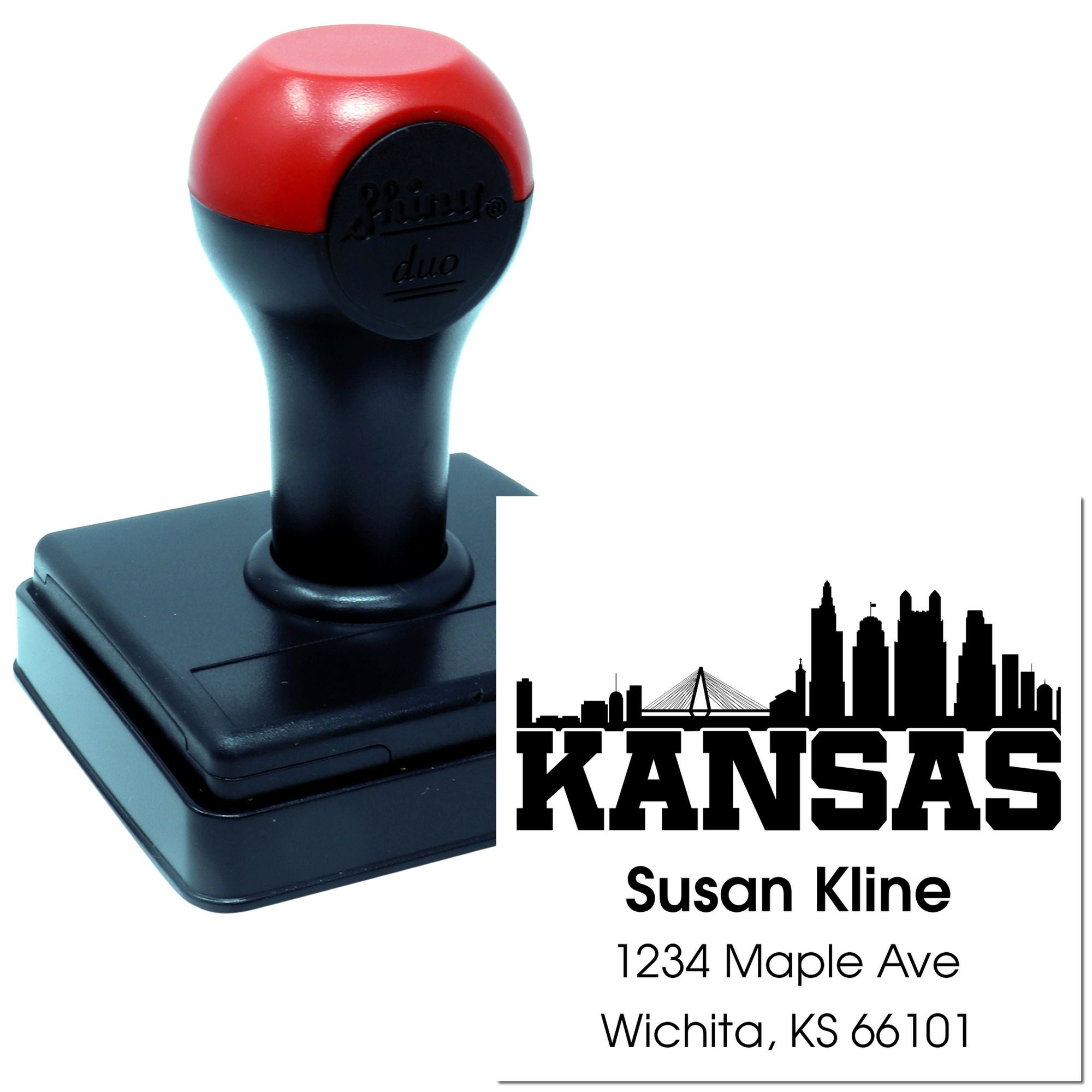 Custom self-inking Kansas address rubber stamp with Wichita skyline and personalized name and address.
