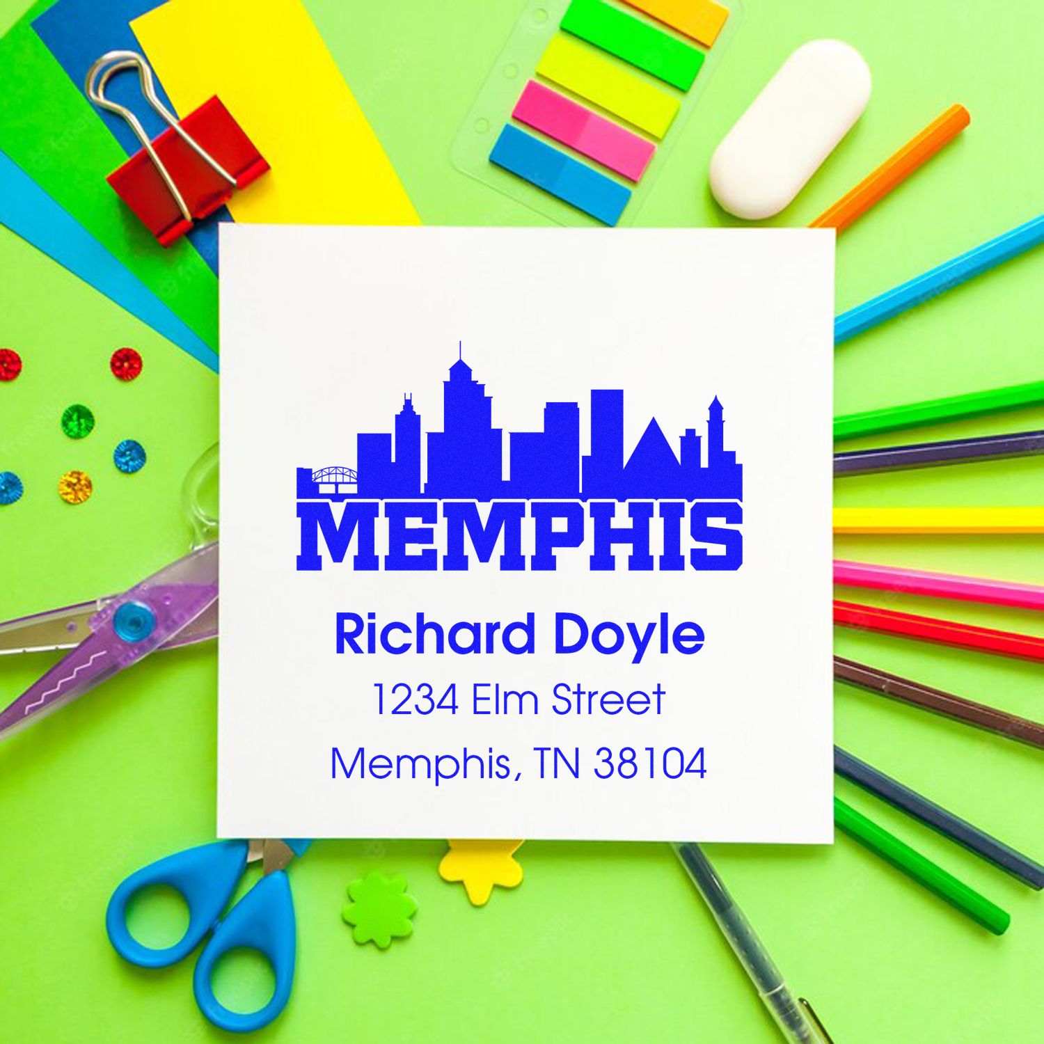 Custom Memphis address rubber stamp with skyline logo, Richard Doyle name, and address for personalized mailing stationery.