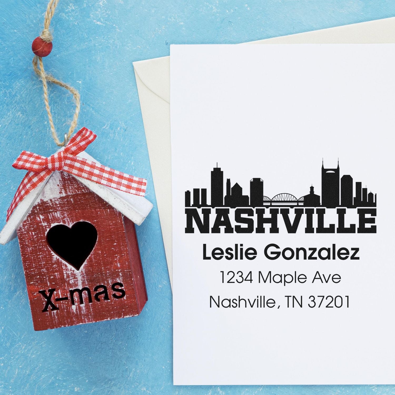 Personalized Nashville address rubber stamp with skyline design, custom name, street address, and ZIP code.