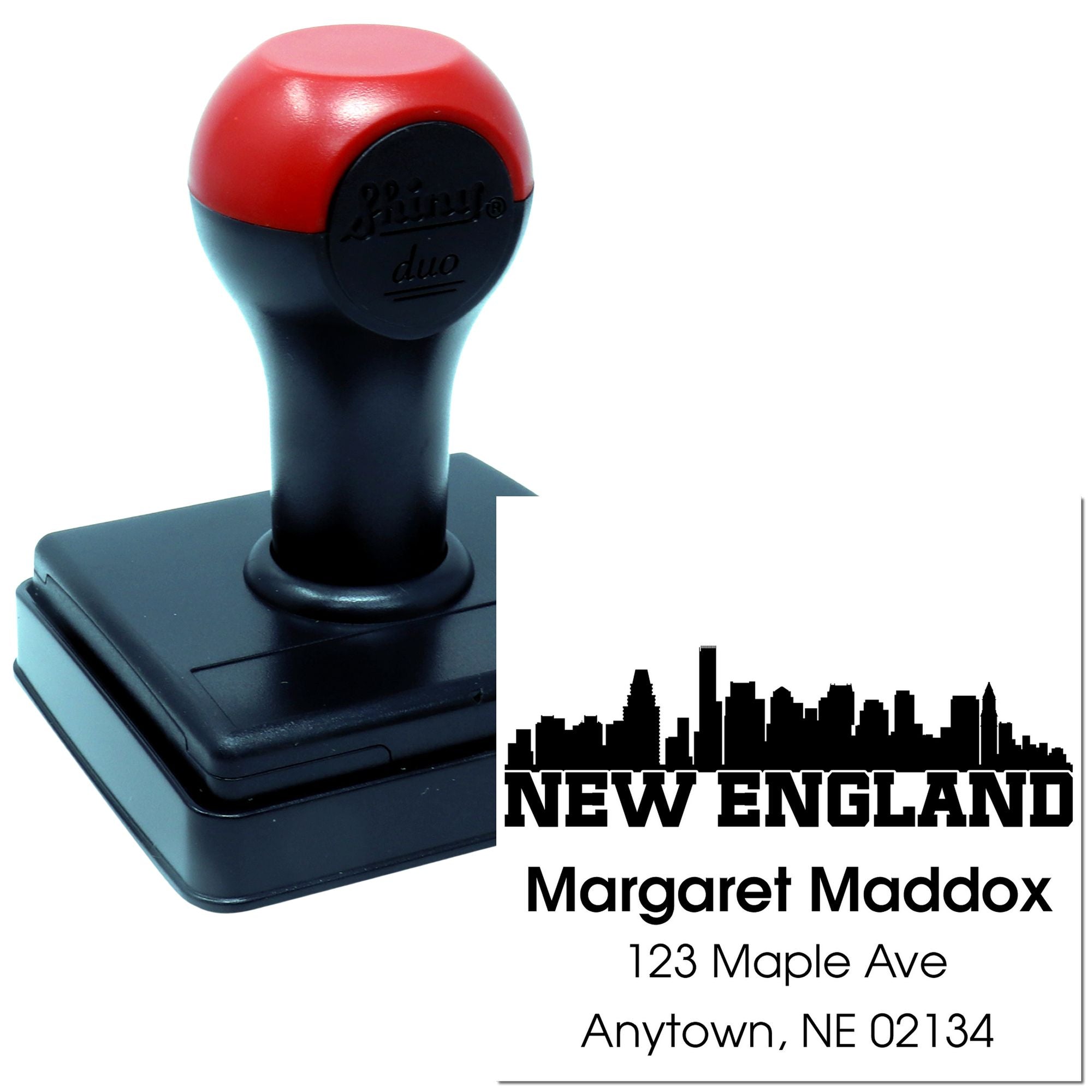 Custom self-inking address rubber stamp with New England skyline for Margaret Maddox, Anytown, NE 02134.