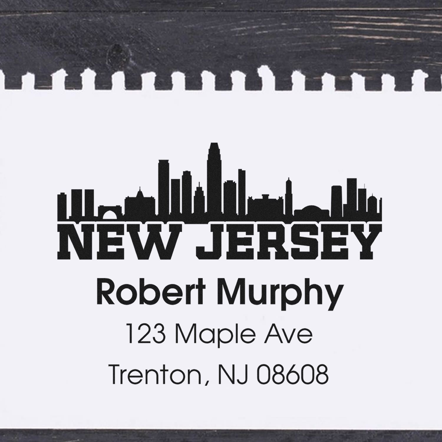 Personalized New Jersey address rubber stamp with skyline design for Robert Murphy, Trenton, NJ 08608.