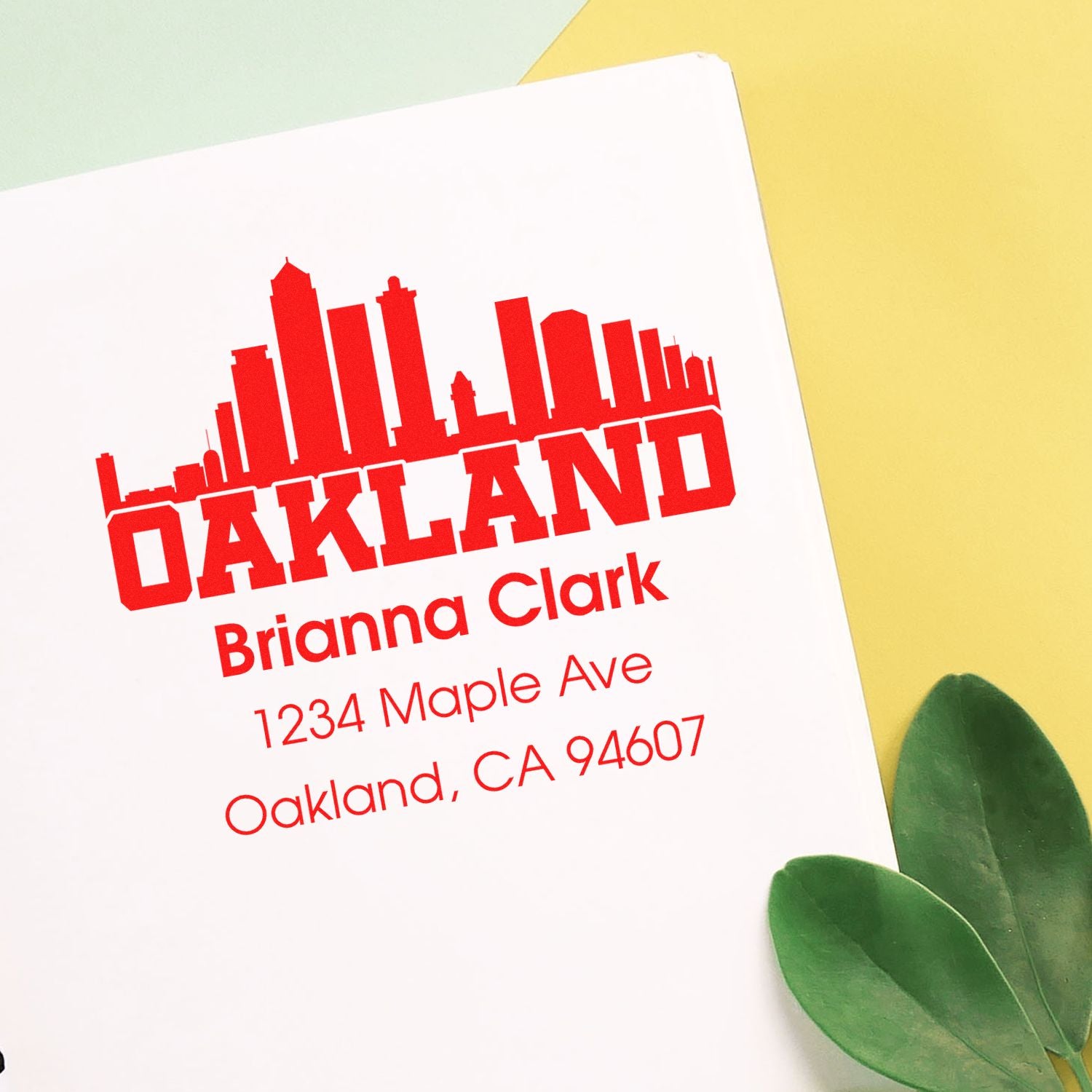 Oakland skyline return address rubber stamp with personalized name and address for custom mailing and stationery.