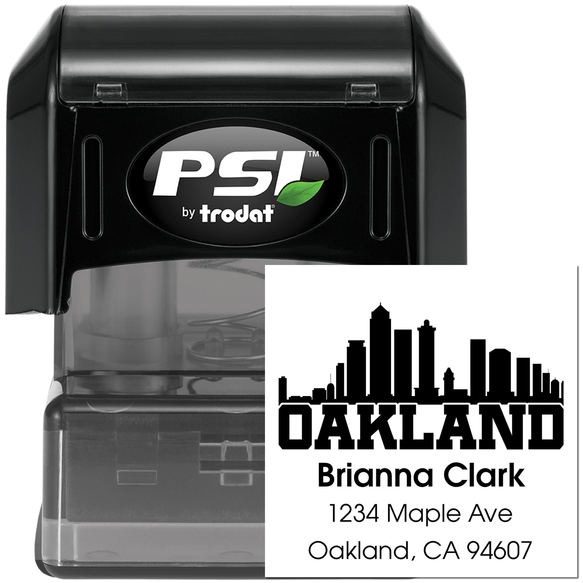 Custom self-inking rubber address stamp by PSI Trodat featuring Oakland skyline and return address.