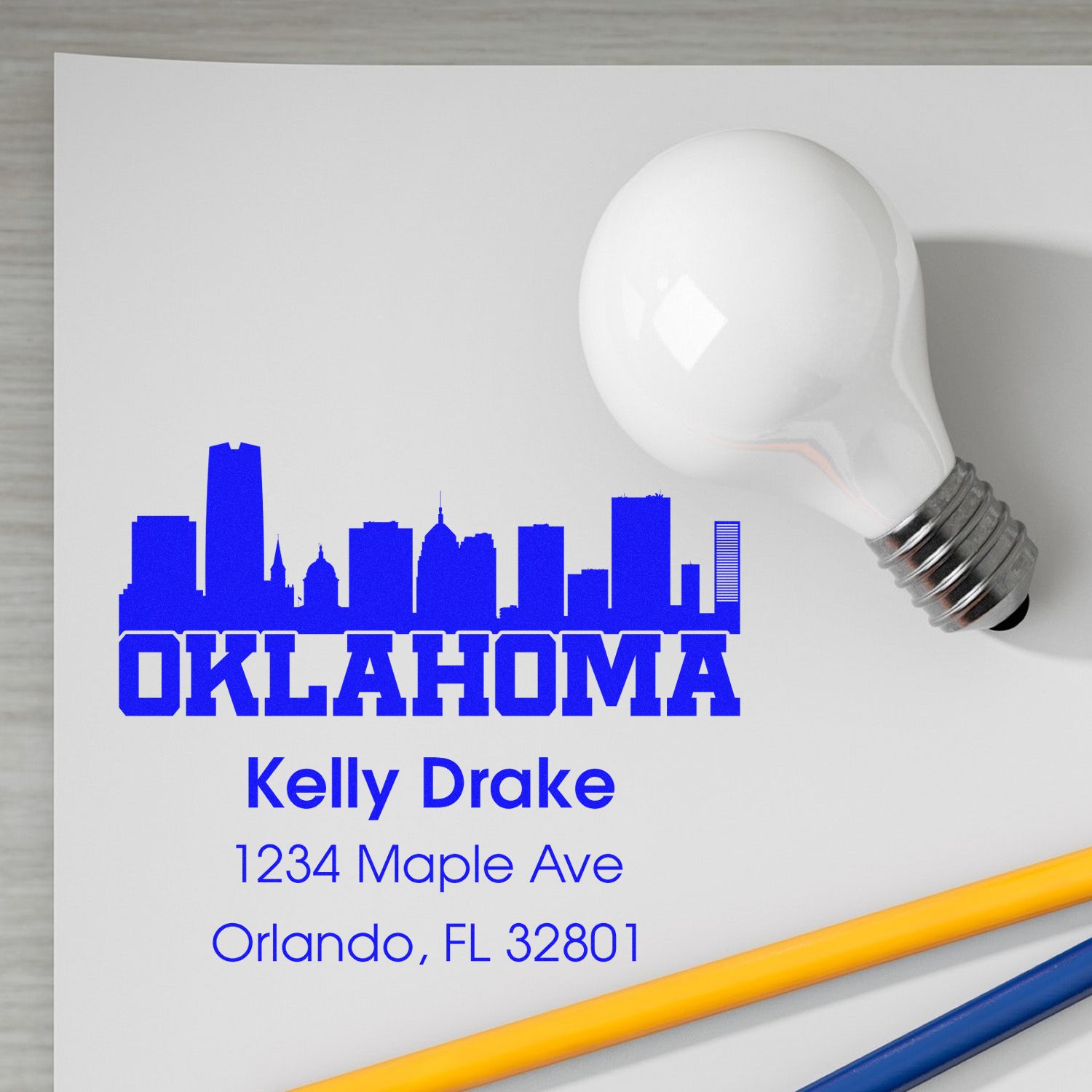 Custom Oklahoma skyline return address rubber stamp mockup with Kelly Drake name and Orlando, FL mailing address.