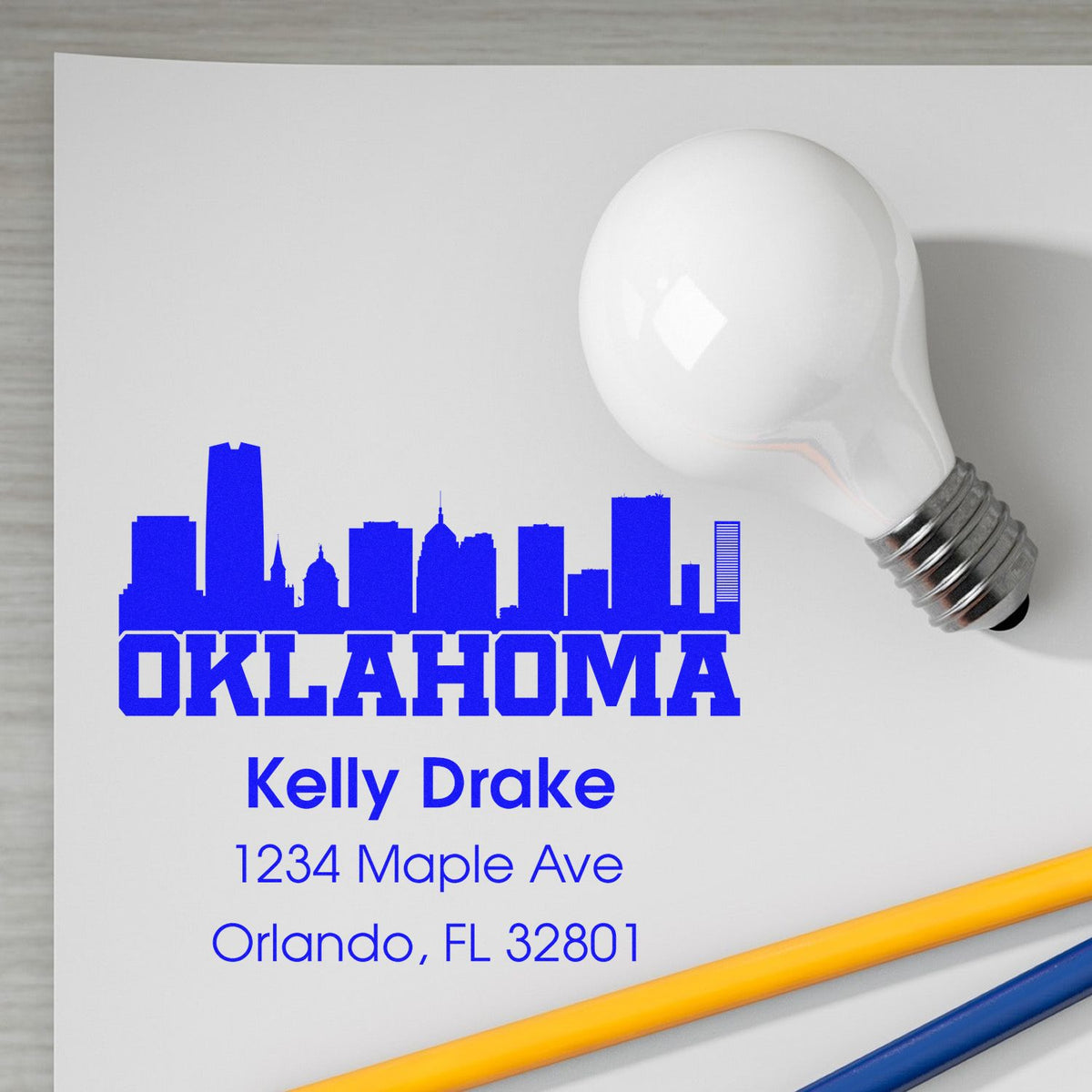 Custom Oklahoma skyline address rubber stamp with Kelly Drake name and Orlando, FL mailing address.