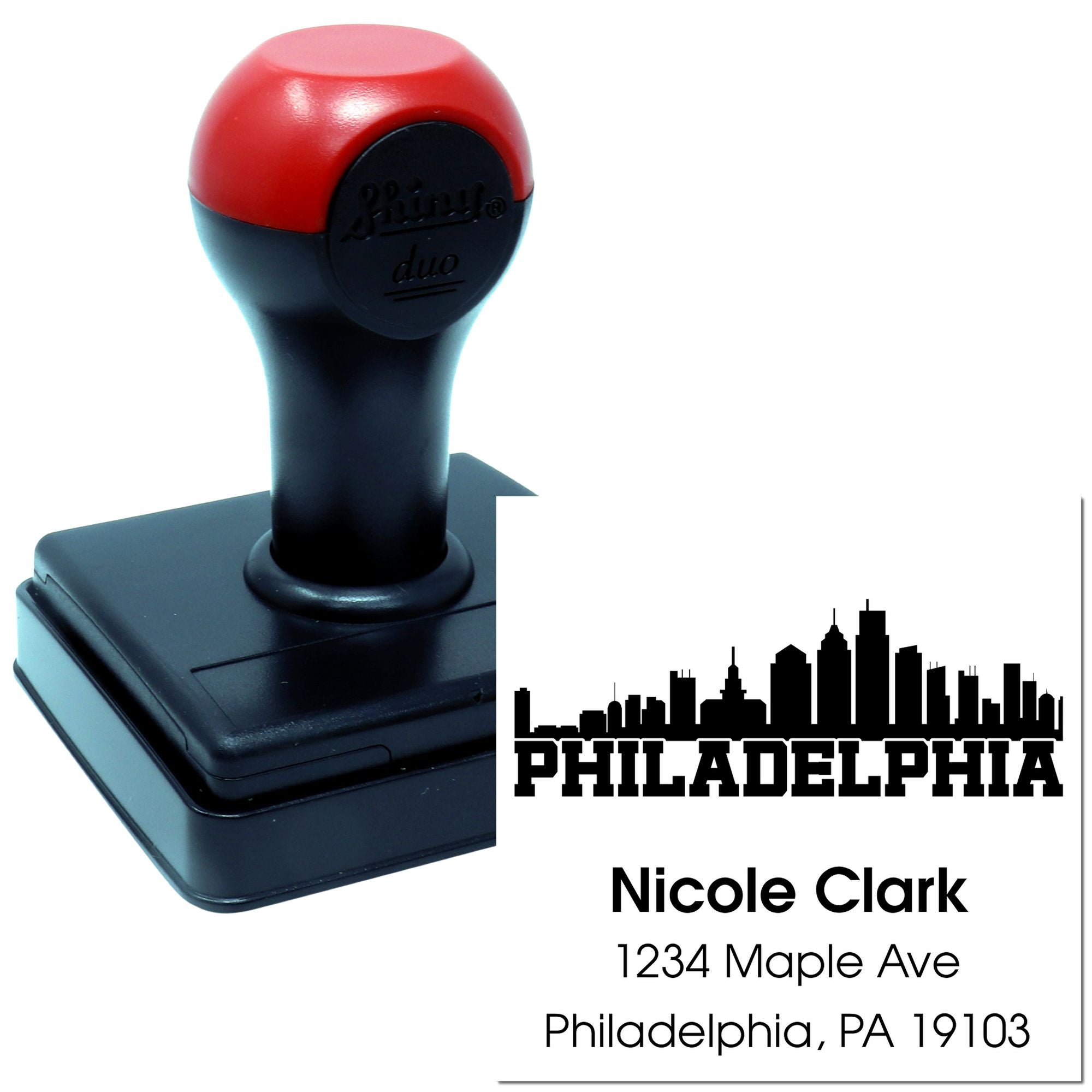Custom self-inking rubber stamp with Philadelphia skyline and personalized return address for business mail.