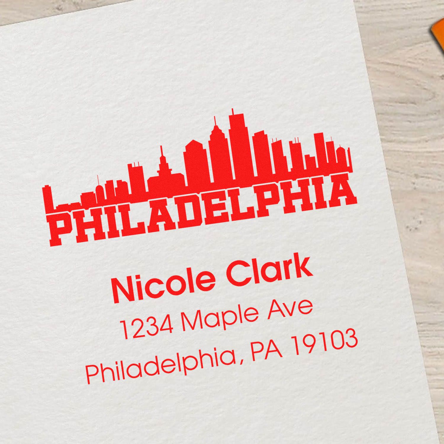 Custom Philadelphia rubber address stamp with skyline, Nicole Clark, 1234 Maple Ave, Philadelphia, PA 19103.