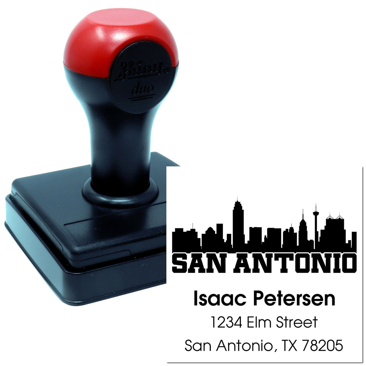 Custom self-inking rubber stamp with San Antonio skyline return address imprint for personalized business mailings.