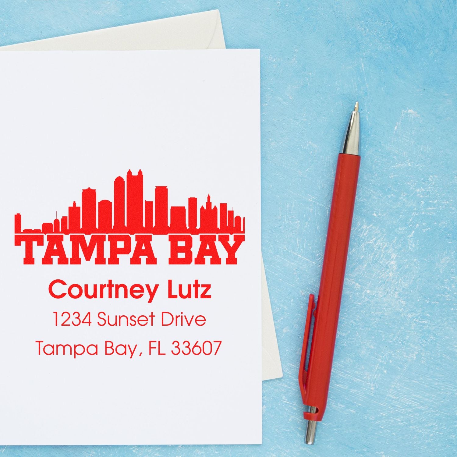 Custom Tampa Bay address rubber stamp on envelope, featuring skyline design for personalized mailing and business branding.