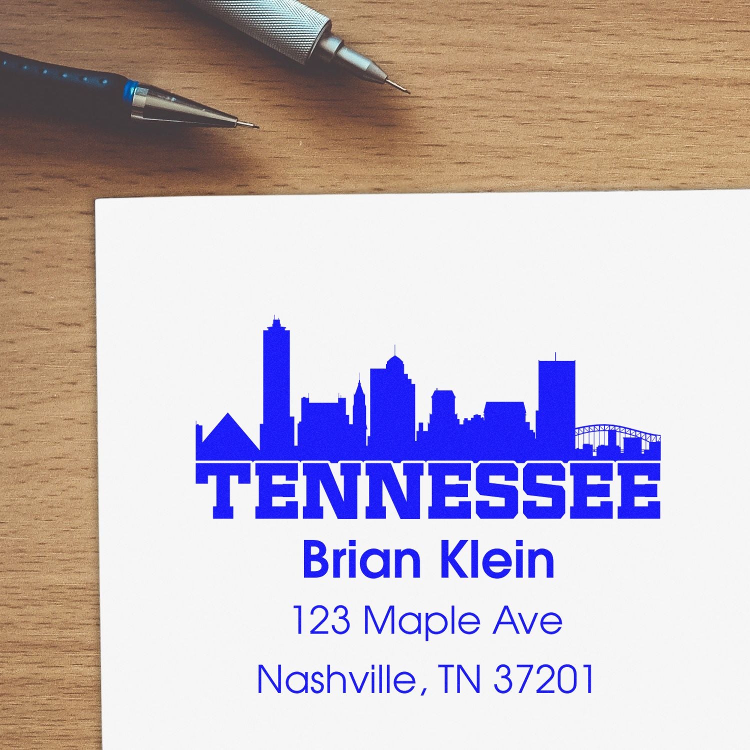 Custom Tennessee return address rubber stamp with Nashville skyline, name, street address, and ZIP code.