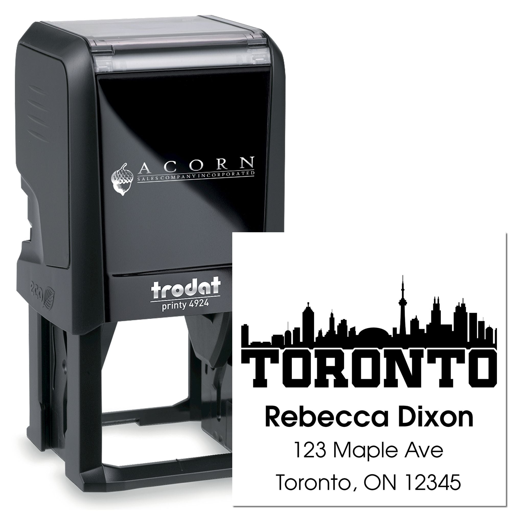 Custom self-inking rubber stamp with Toronto skyline, name, and address for personalized mailing and business branding.