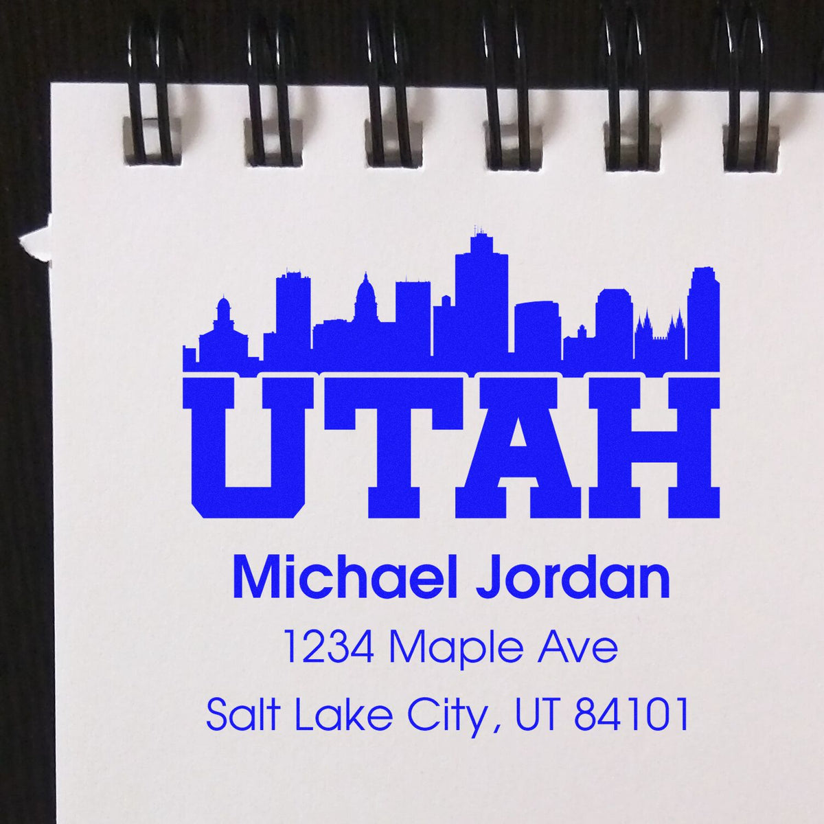 Personalized Utah return address rubber stamp with skyline, name Michael Jordan, and Salt Lake City, UT mailing details.