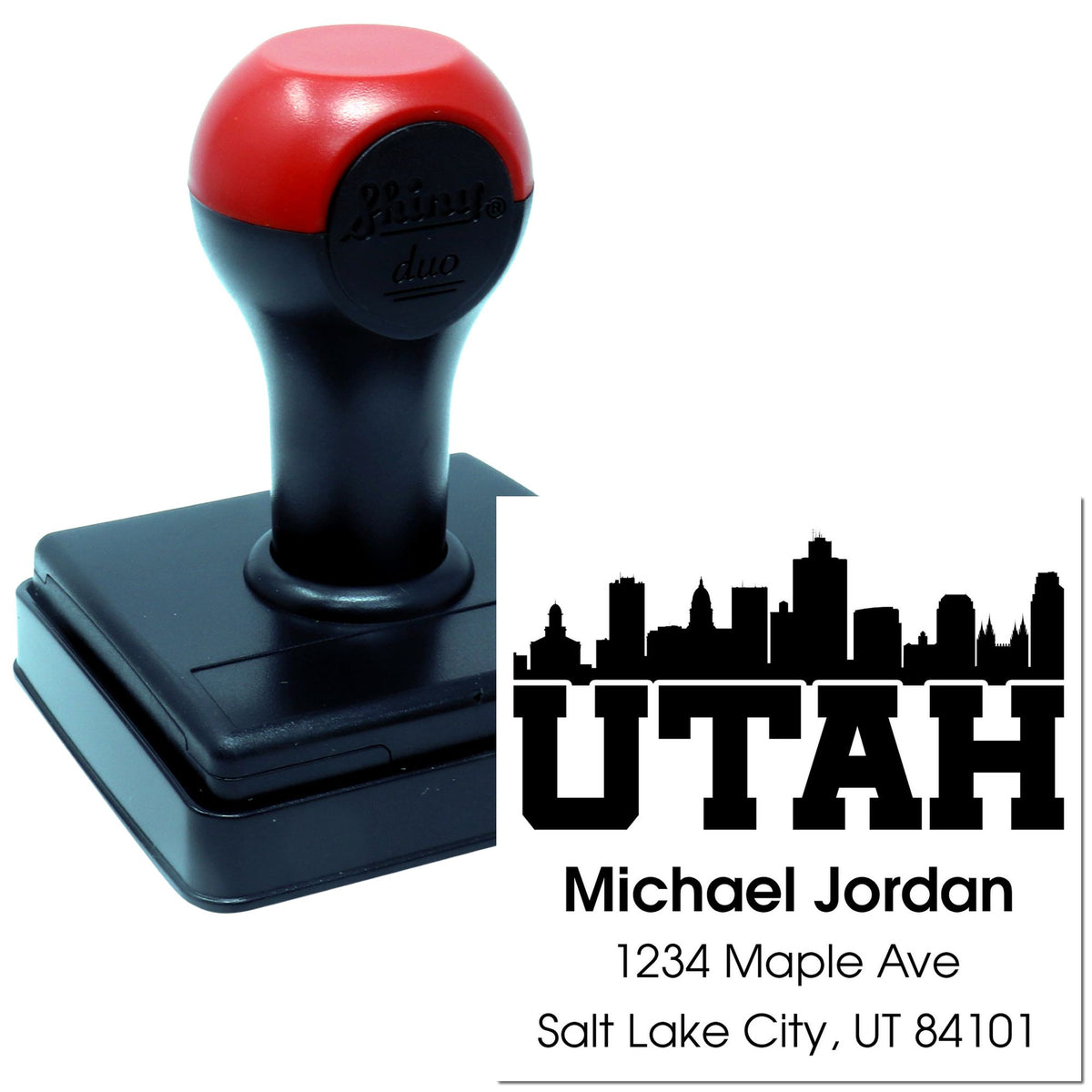 Custom self-inking rubber address stamp for Utah, featuring a skyline design with personalized name and address.
