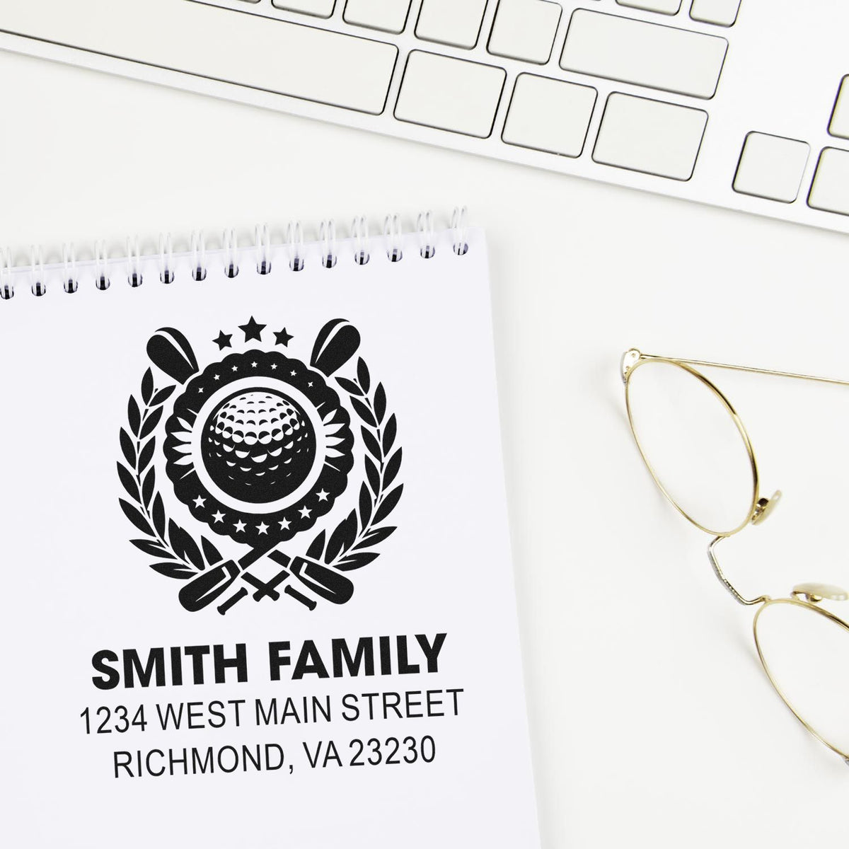 Custom rubber stamp for family return address, featuring a monogram crest and address for personalized mail labeling.