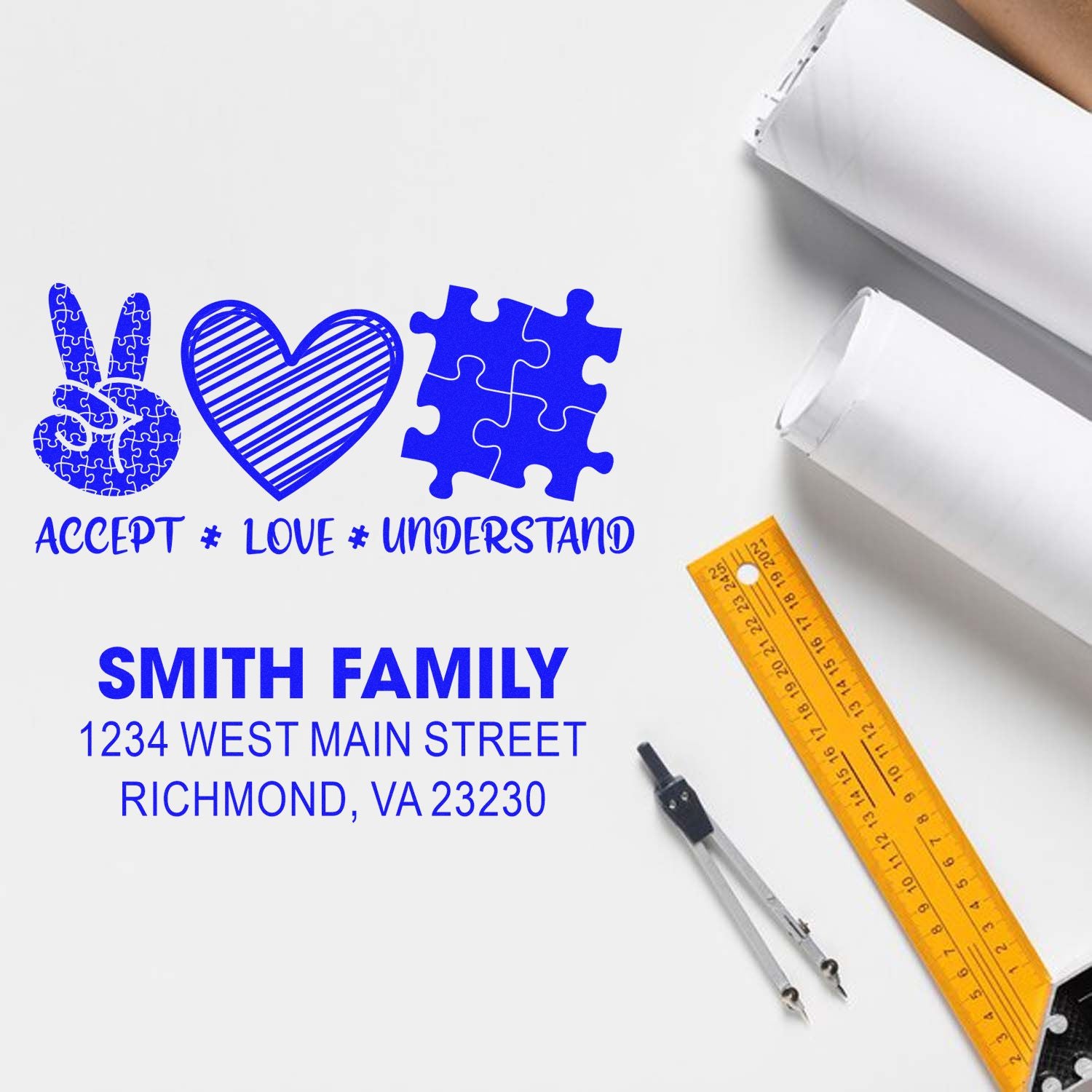 Custom family return address rubber stamp with puzzle heart design and Accept, Love, Understand slogan.