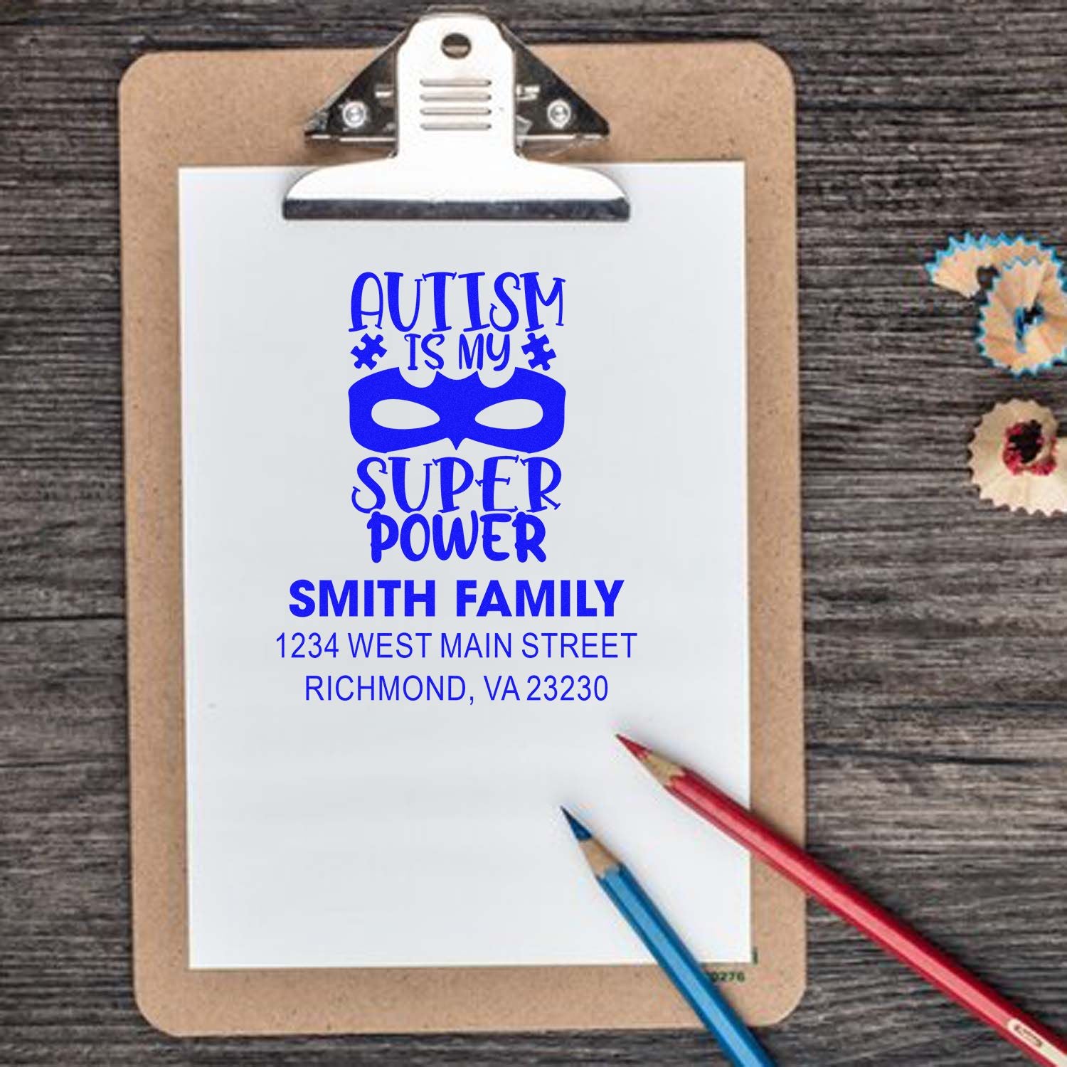 Personalized autism awareness rubber stamp with superhero design and family return address for envelopes and cards.