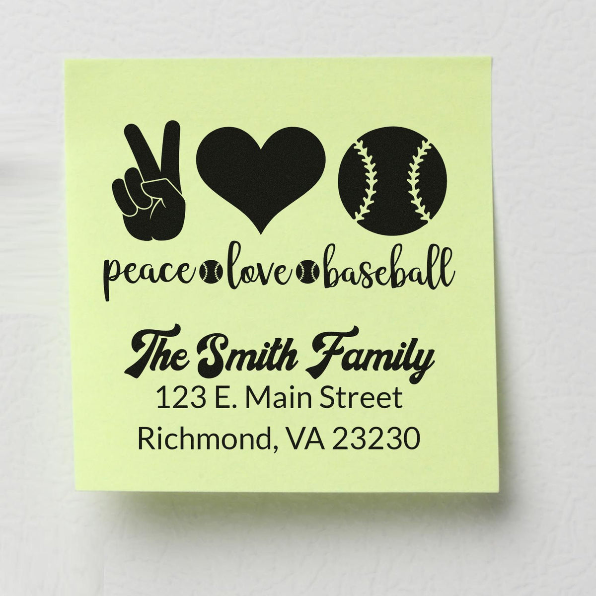 Custom rubber stamp design with peace love baseball theme, family name, and address on a sample note.