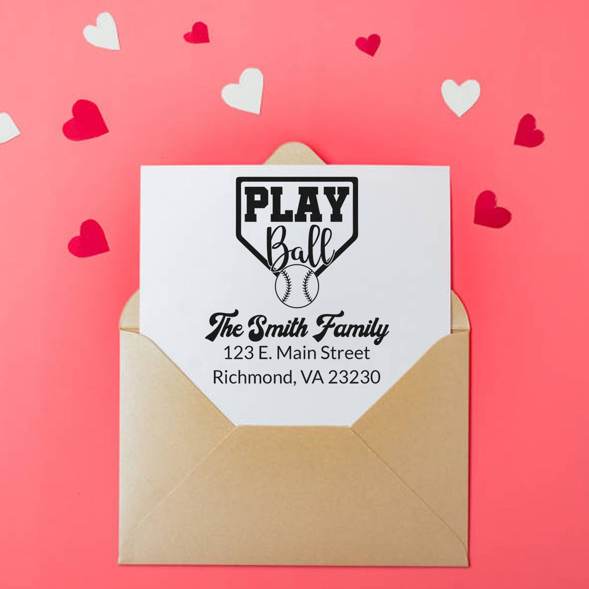 Custom Play Ball return address rubber stamp on envelope for The Smith Family, with baseball design and hearts.
