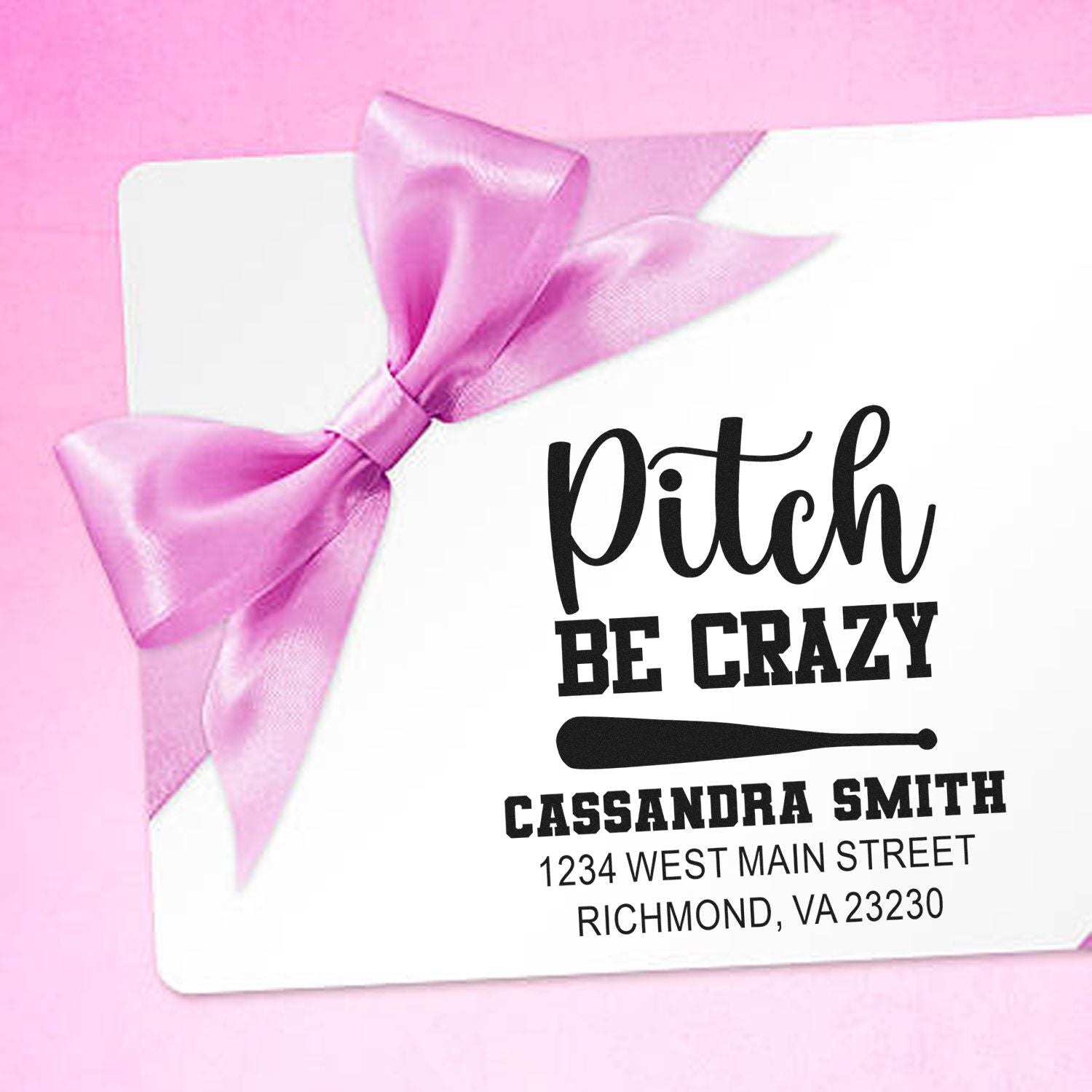 Custom rubber return address stamp with Pitch Be Crazy baseball design and pink bow for personalized envelopes.
