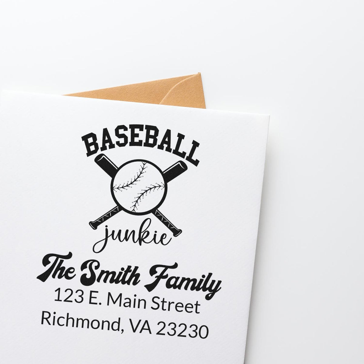Personalized baseball rubber stamp for mail, featuring Baseball Junkie, family name, and return address.