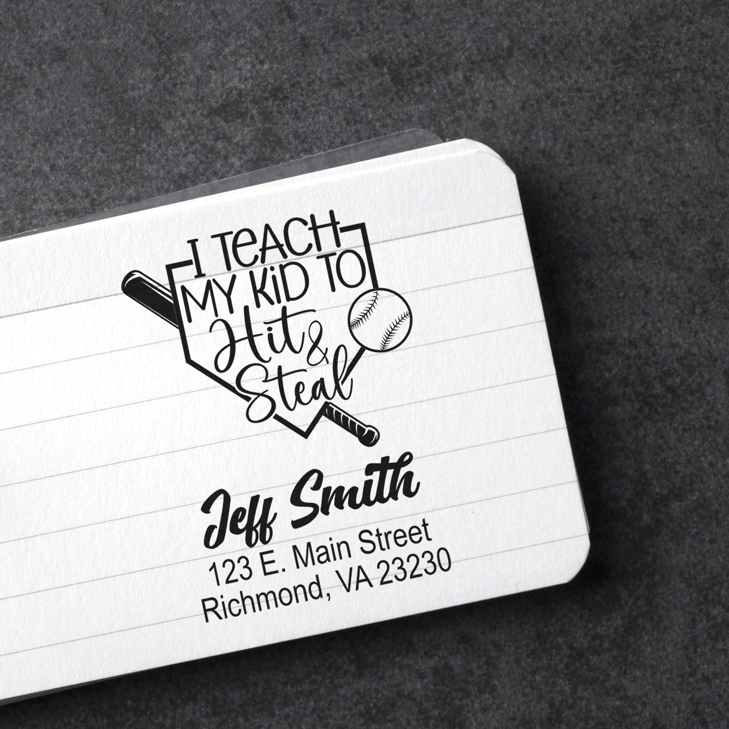 Custom teacher baseball rubber stamp with name and address, reading I Teach My Kid to Hit & Steal on notebook paper.